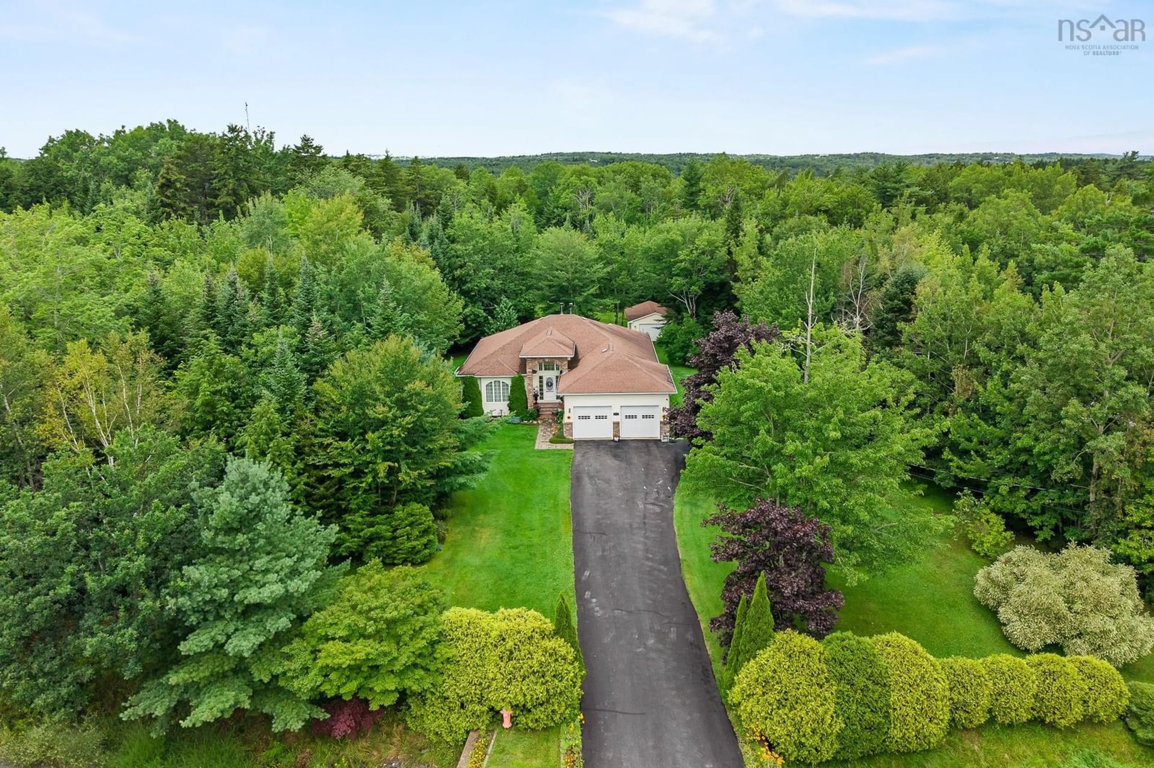 A pic from outside/outdoor area/front of a property/back of a property/a pic from drone, unknown for 11 Taylor Dr, Windsor Junction Nova Scotia B2T 1K7