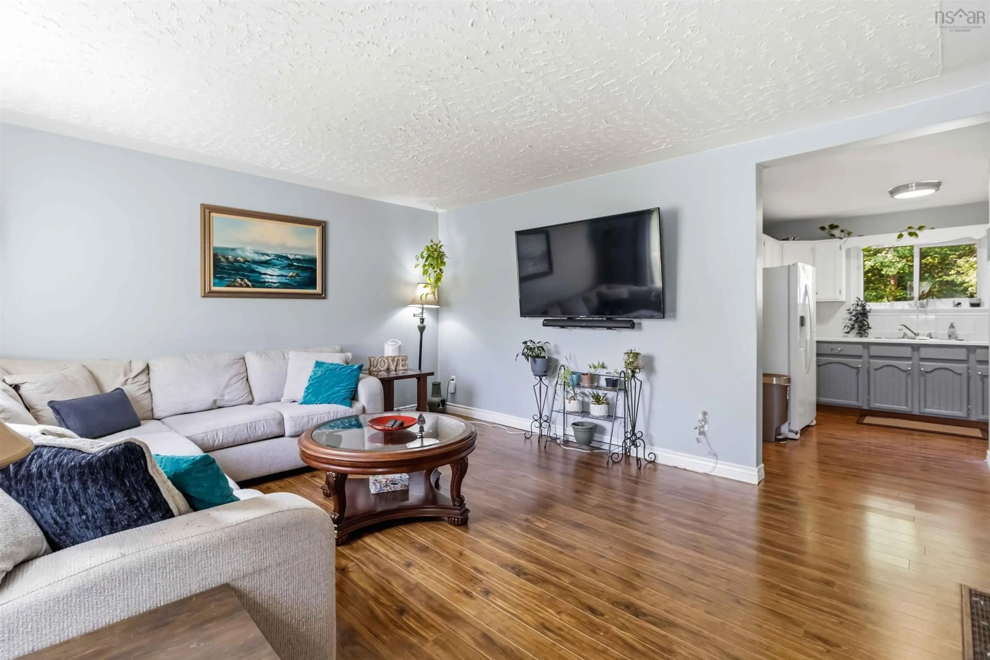 Living room with furniture, wood/laminate floor for 32 Lynnville Dr, Lower Sackville Nova Scotia B4C 2H8