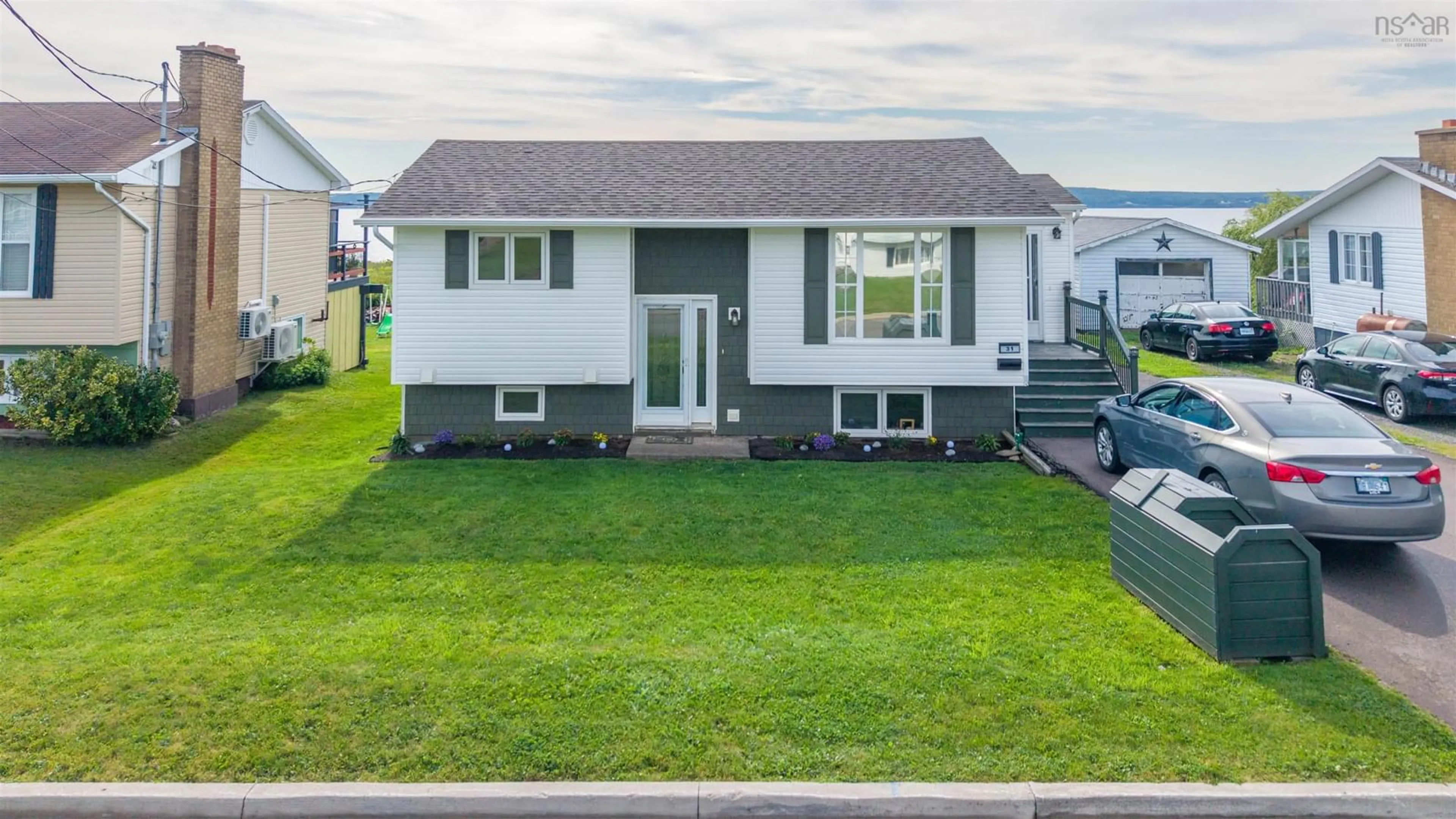 Home with vinyl exterior material, street for 31 Amber Dr, Sydney Mines Nova Scotia B1V 1C6
