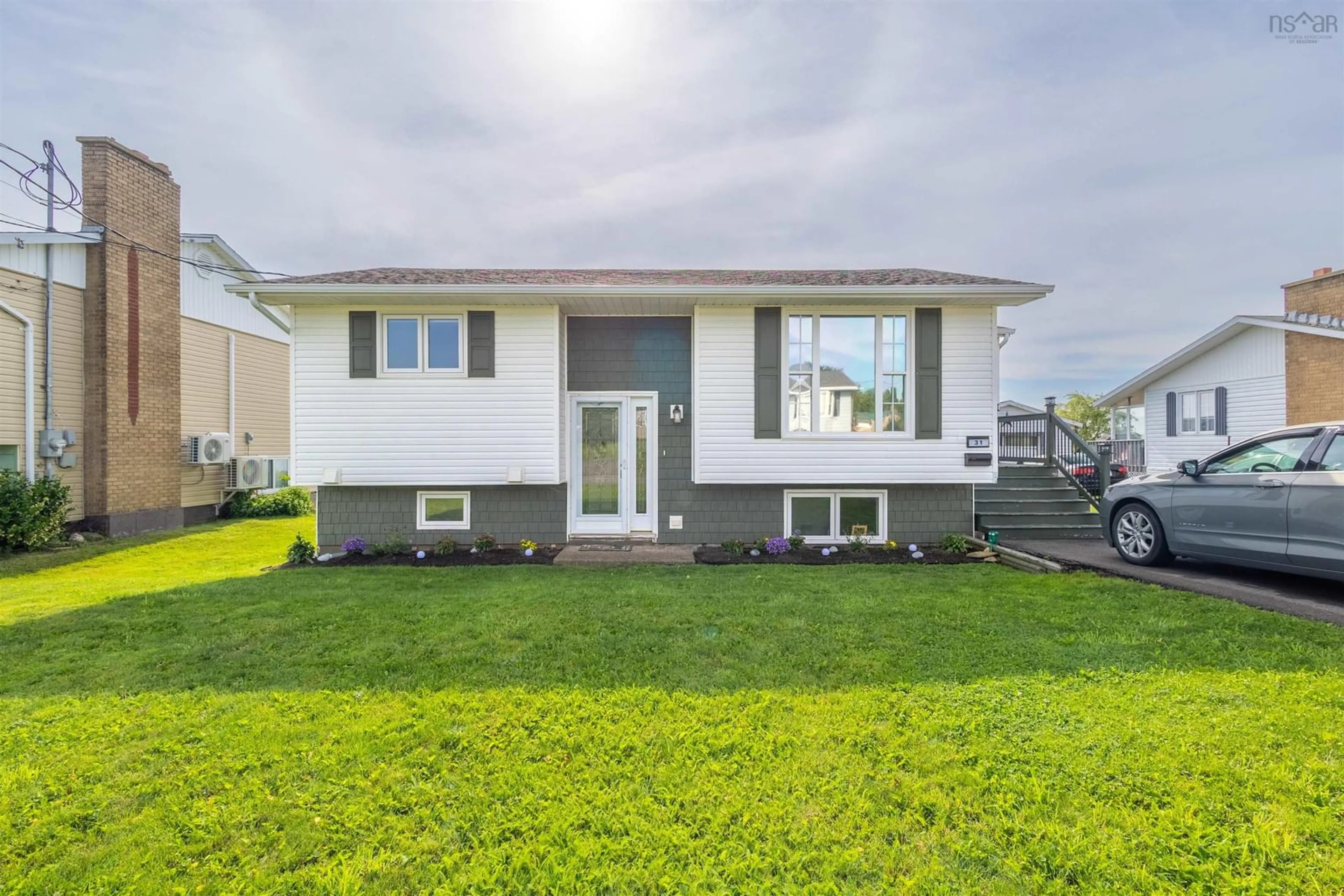 Home with vinyl exterior material, street for 31 Amber Dr, Sydney Mines Nova Scotia B1V 1C6