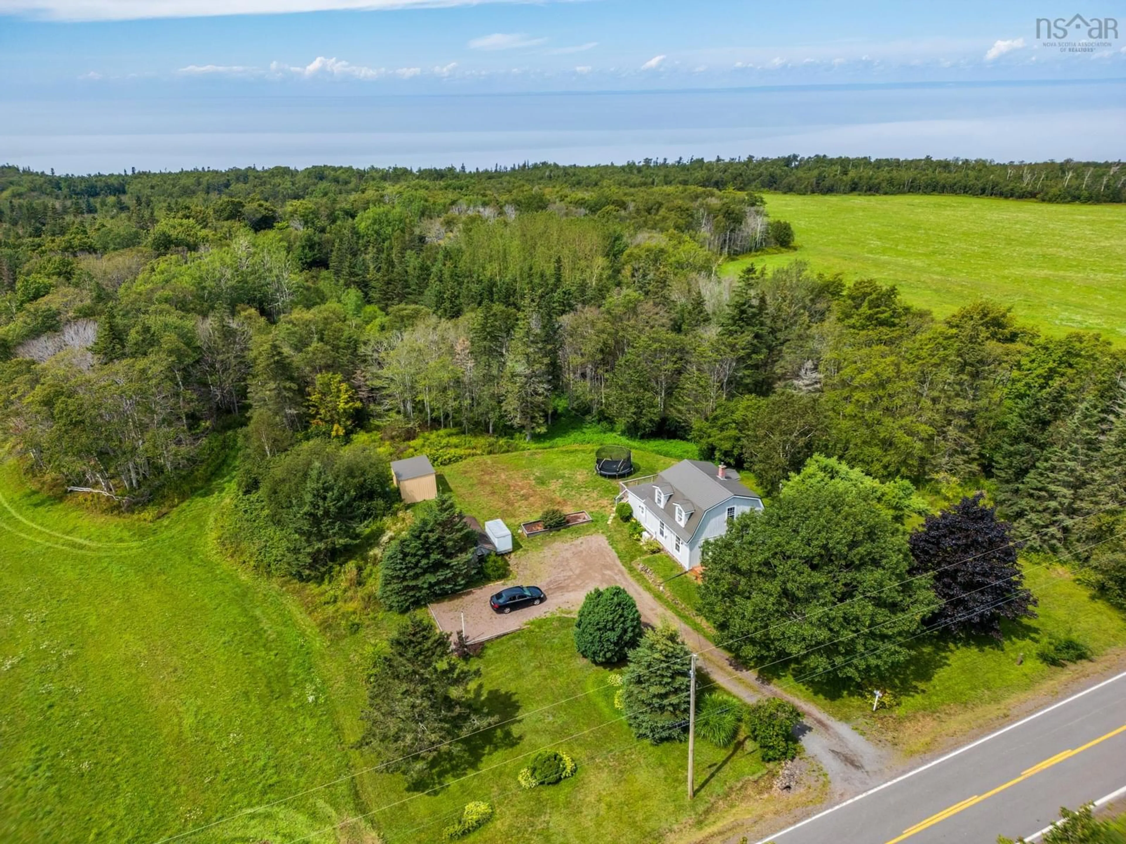 A pic from outside/outdoor area/front of a property/back of a property/a pic from drone, water/lake/river/ocean view for 2415 Highway 362 Hwy, Margaretsville Nova Scotia B0S 1P0