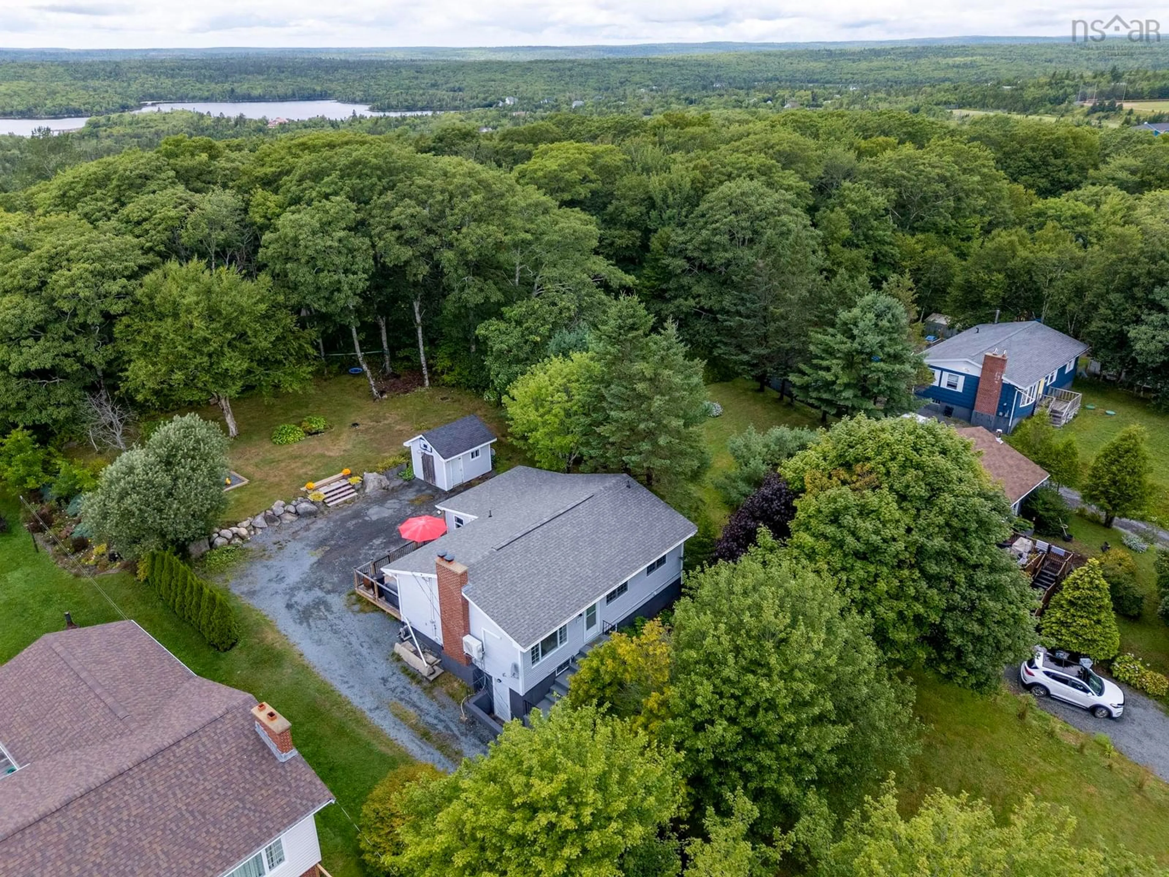 A pic from outside/outdoor area/front of a property/back of a property/a pic from drone, water/lake/river/ocean view for 117 Brookside Rd, Brookside Nova Scotia B3T 1S3