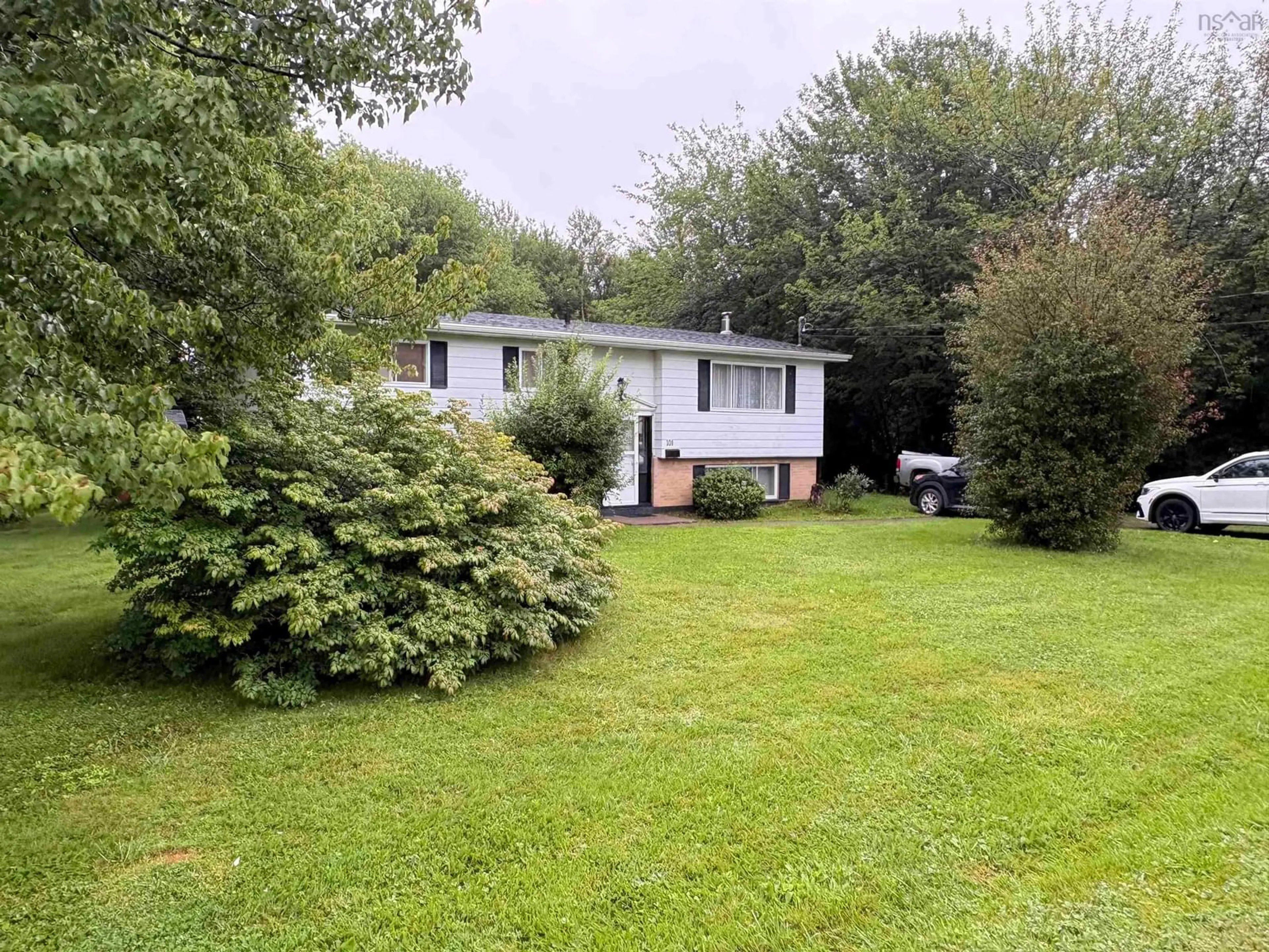A pic from outside/outdoor area/front of a property/back of a property/a pic from drone, street for Kenwood Dr #101, Sydney River Nova Scotia B1S 3L1