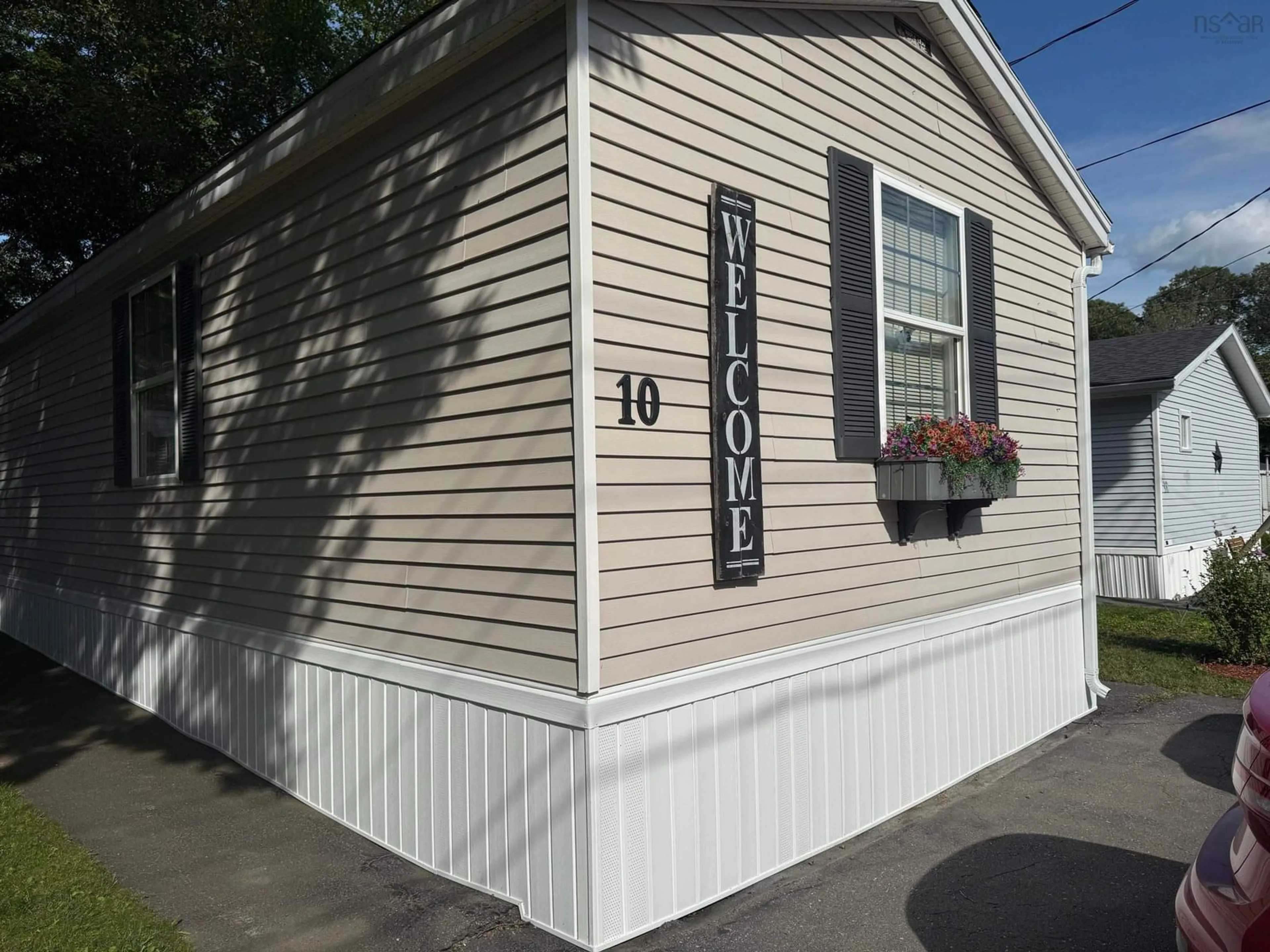 Home with vinyl exterior material, street for 10 Fall St, Bridgewater Nova Scotia B4V 3V6