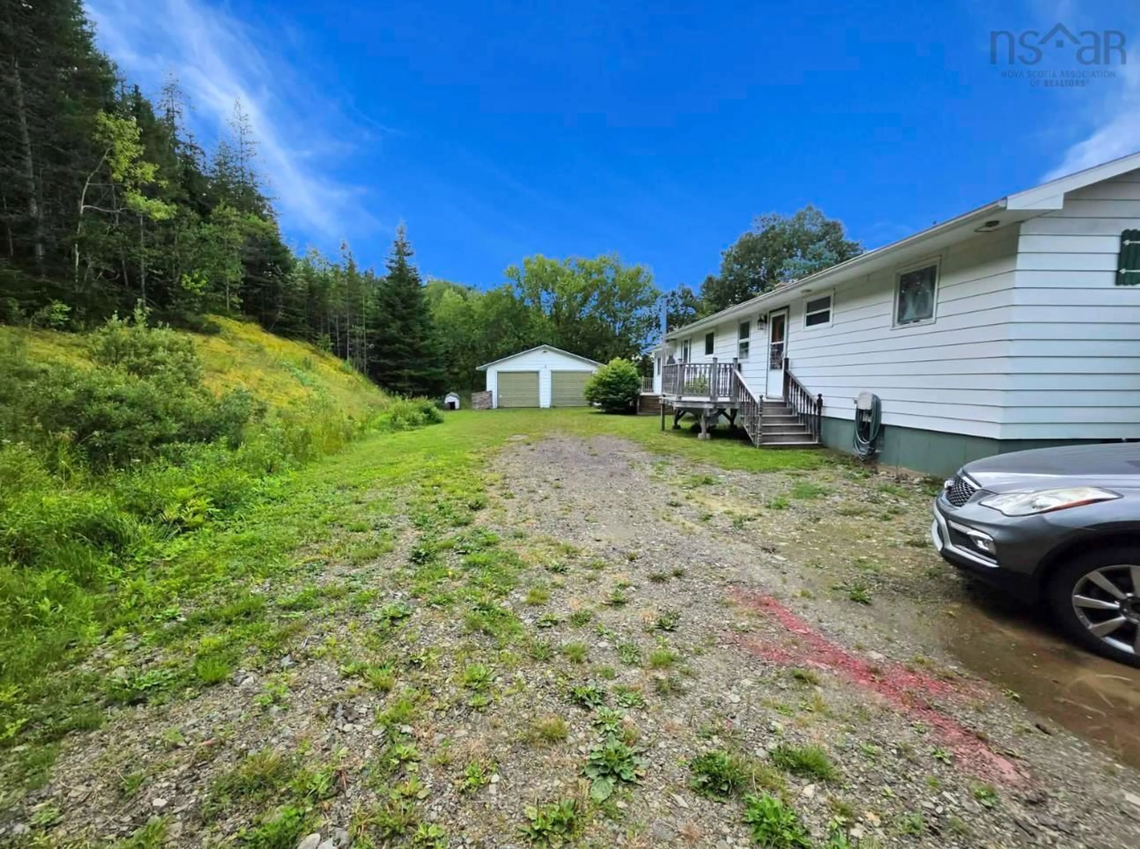 A pic from outside/outdoor area/front of a property/back of a property/a pic from drone, unknown for 206 Trout Brook Rd, Marion Bridge Nova Scotia B1K 2G3