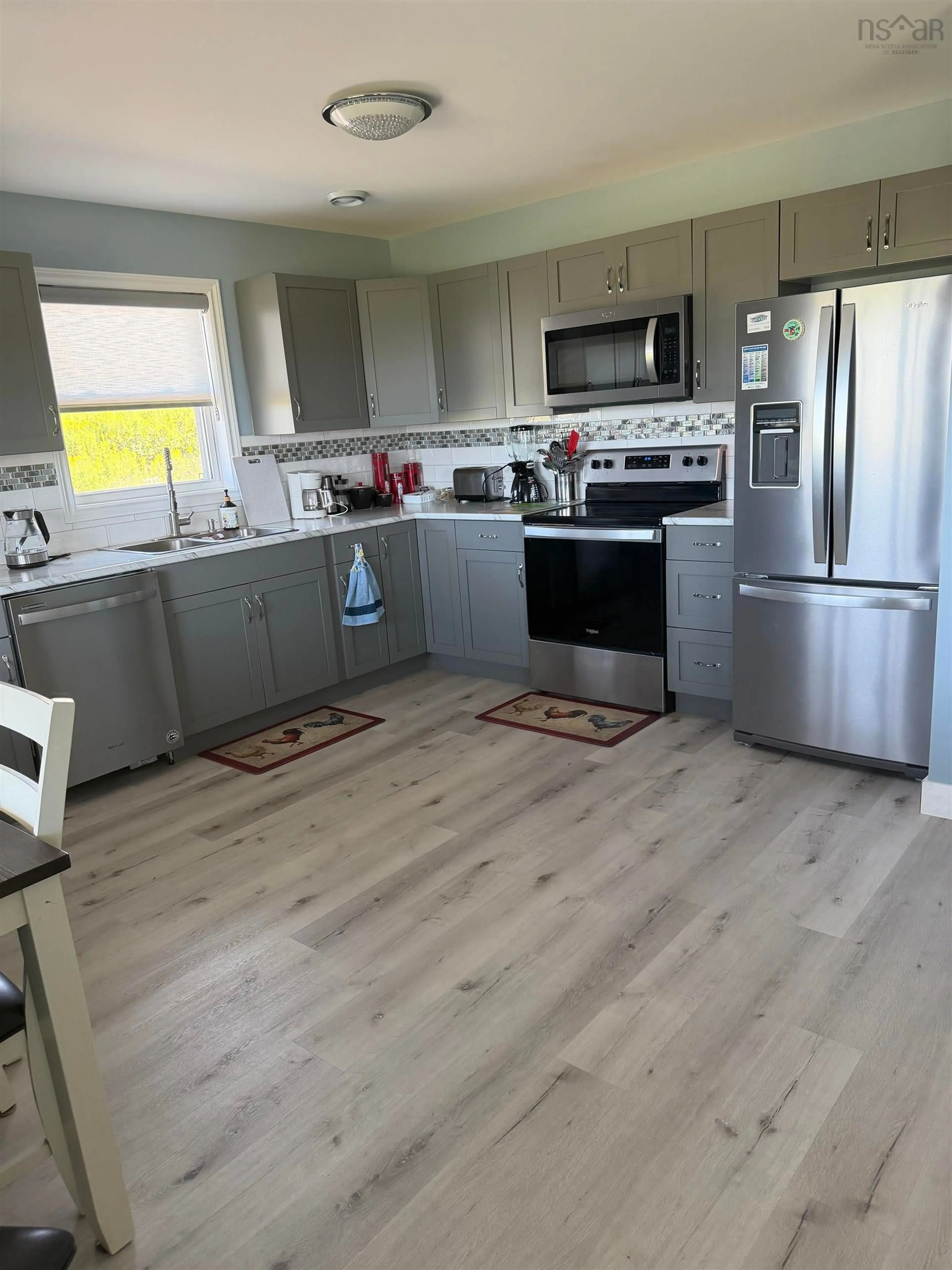 Open concept kitchen, wood/laminate floor for 960 Mira Bay Dr, Catalone Gut Nova Scotia B1C 2B8