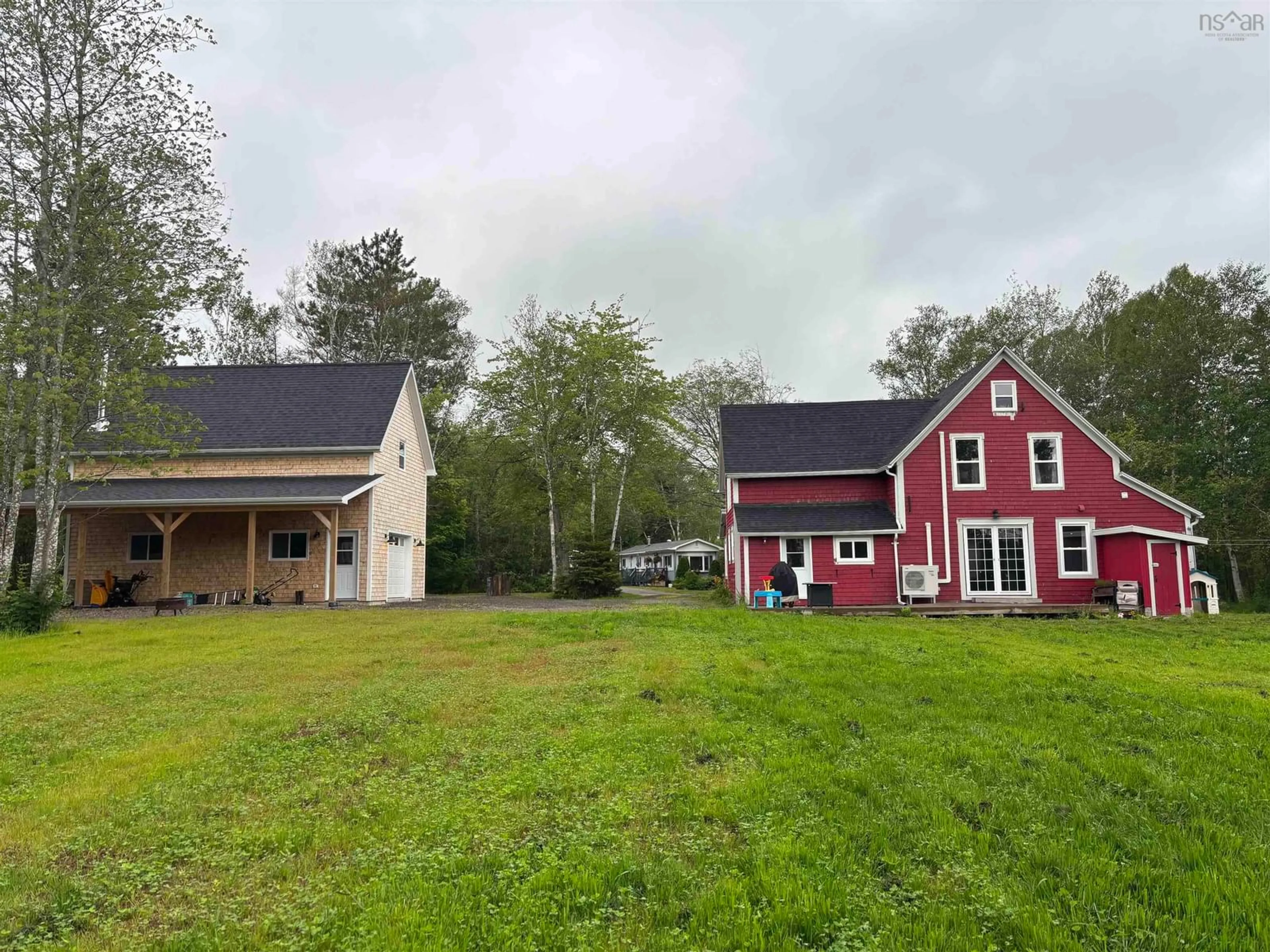 A pic from outside/outdoor area/front of a property/back of a property/a pic from drone, unknown for 138 Queen St, Baddeck Nova Scotia B0E 1B0