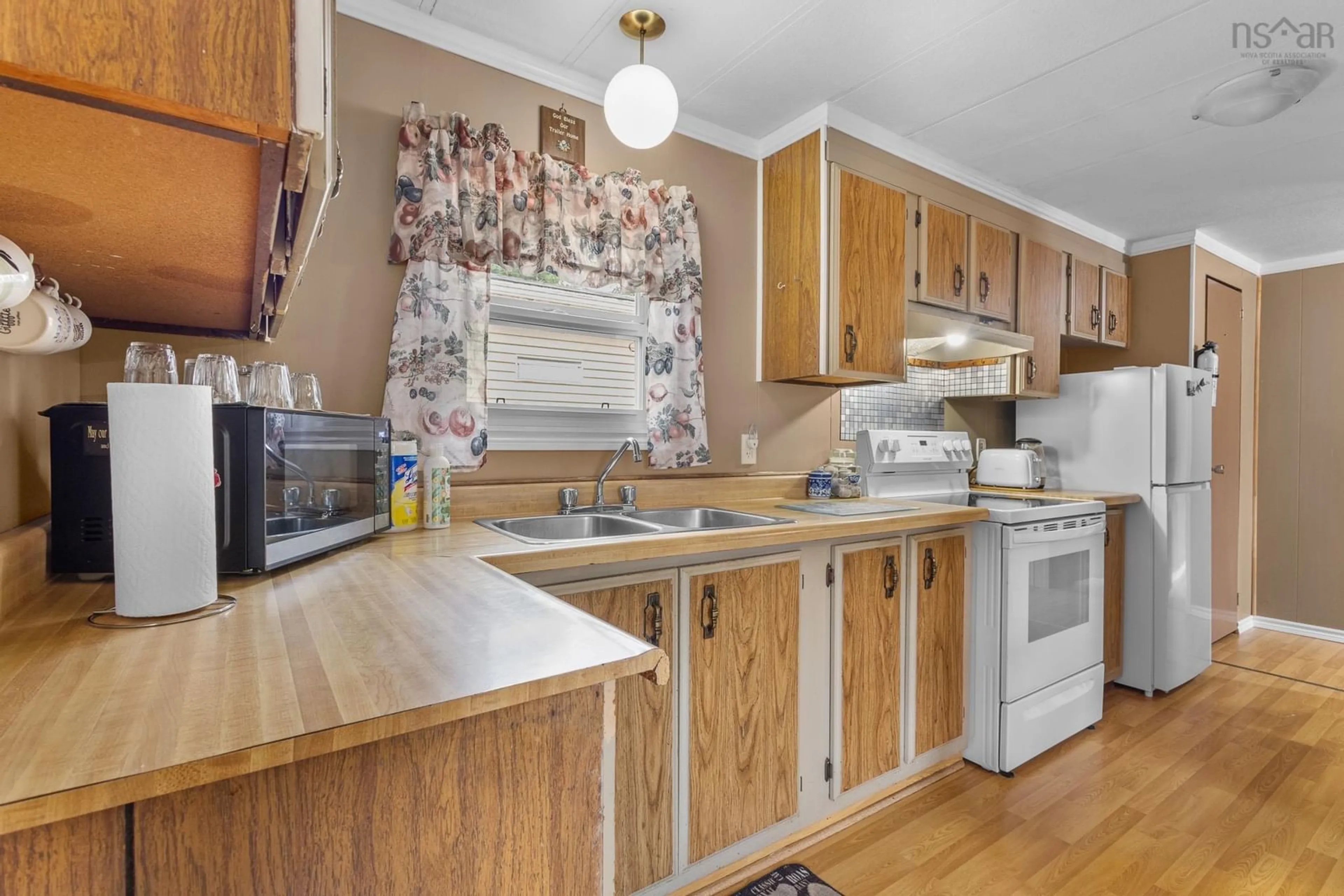 Standard kitchen, wood/laminate floor for 64 Bridget Avenue, Halifax Nova Scotia B3R 1H8