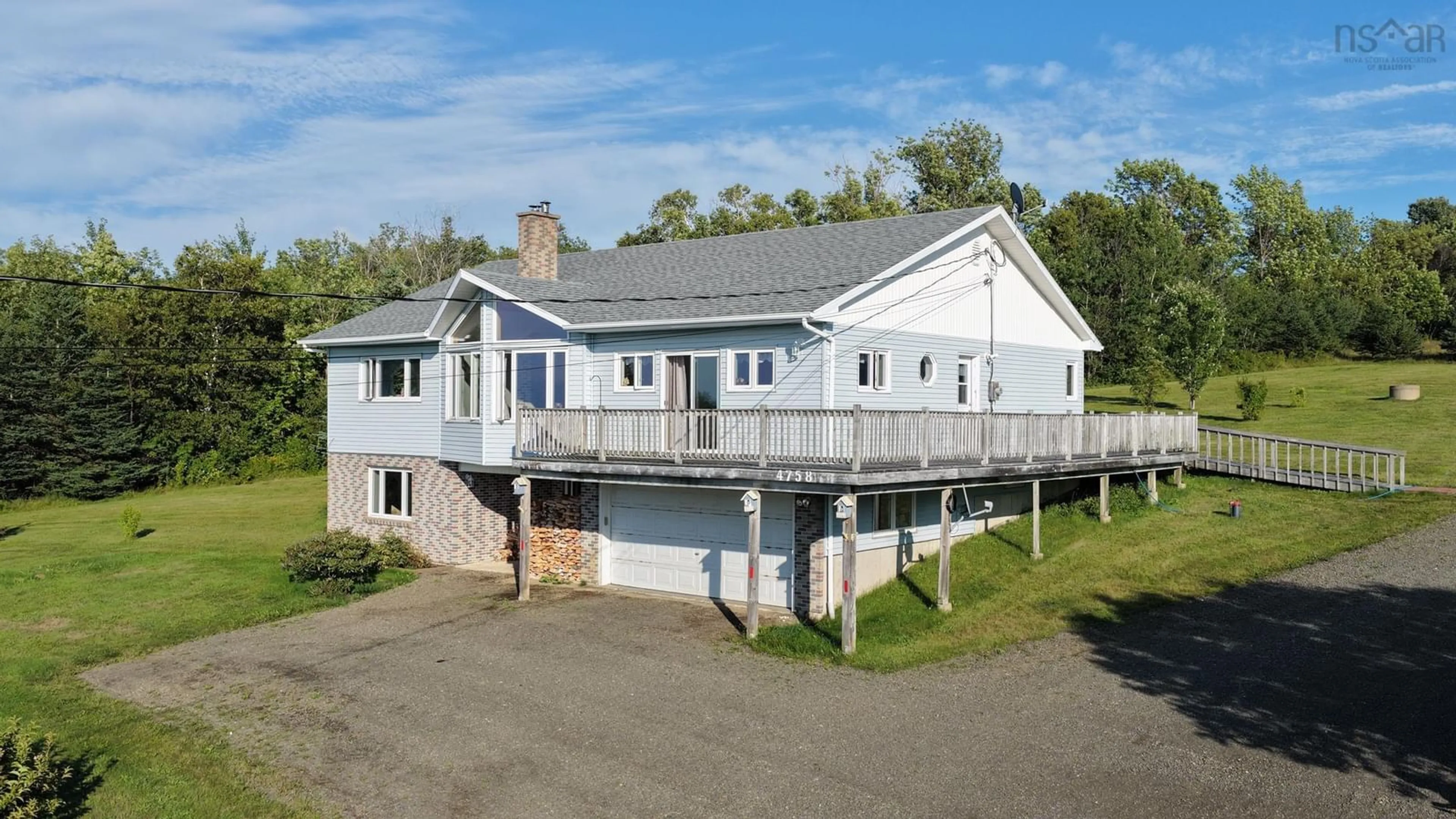 A pic from outside/outdoor area/front of a property/back of a property/a pic from drone, unknown for 4758 Shore Rd, Parkers Cove Nova Scotia B0S 1K0