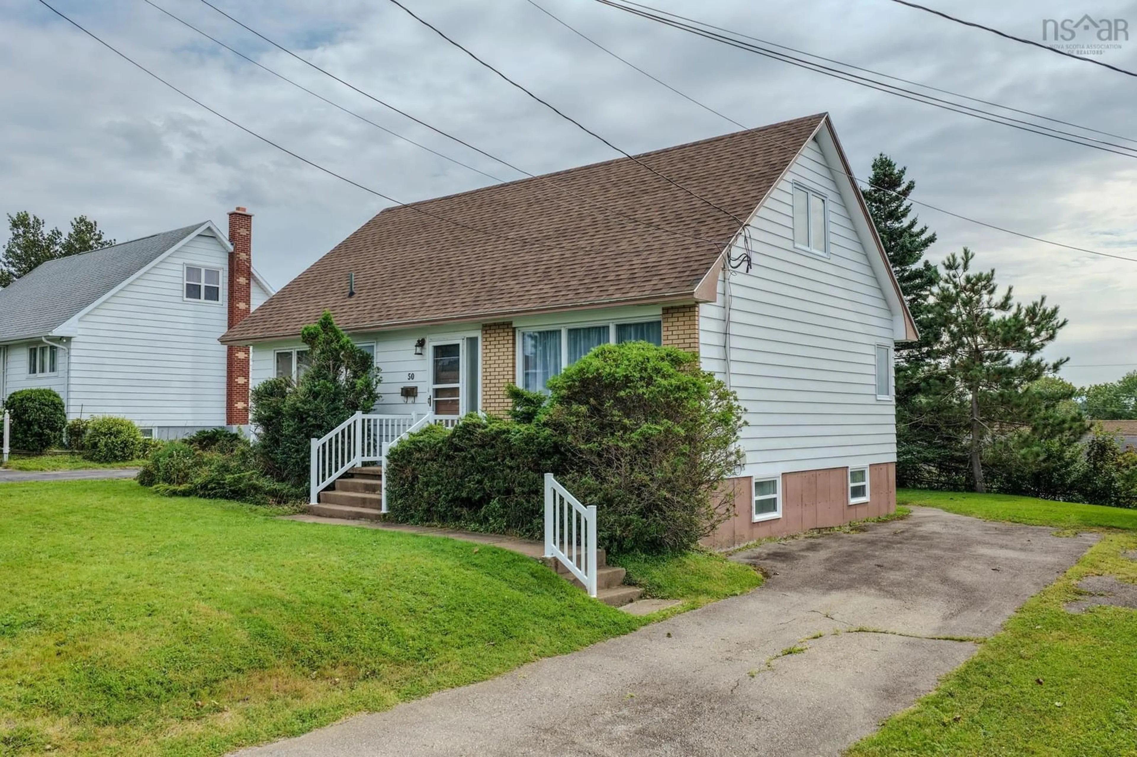 Home with vinyl exterior material, street for 50 Lynne Dr, Sydney Nova Scotia B1P 2Z8