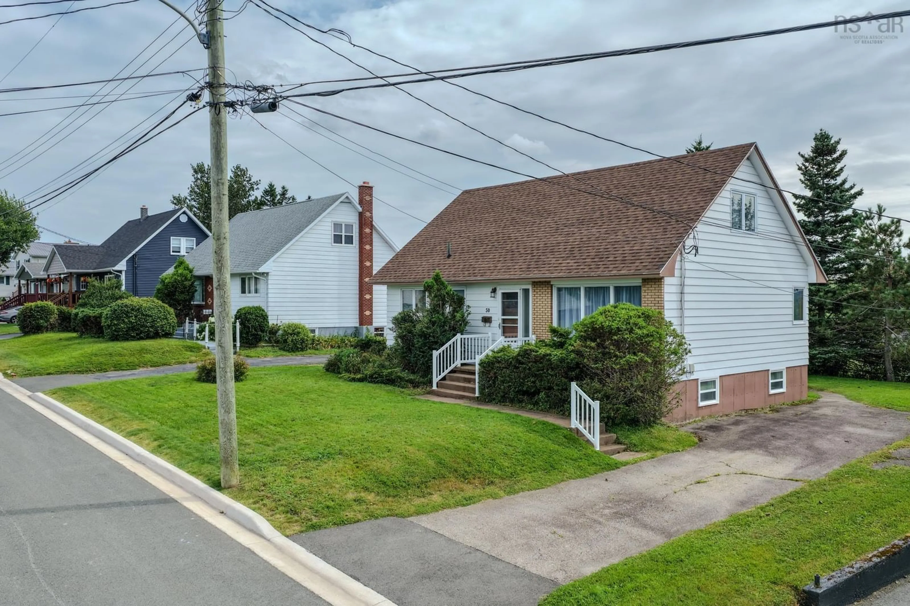 A pic from outside/outdoor area/front of a property/back of a property/a pic from drone, street for 50 Lynne Dr, Sydney Nova Scotia B1P 2Z8