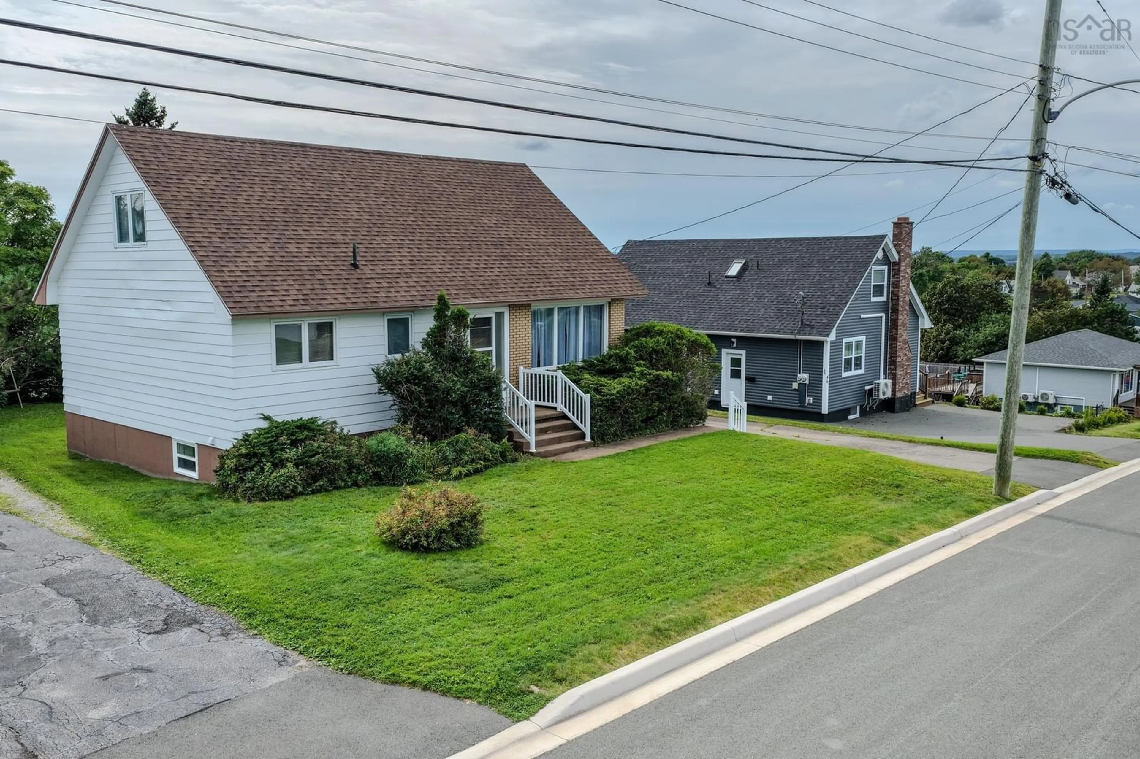 A pic from outside/outdoor area/front of a property/back of a property/a pic from drone, street for 50 Lynne Dr, Sydney Nova Scotia B1P 2Z8