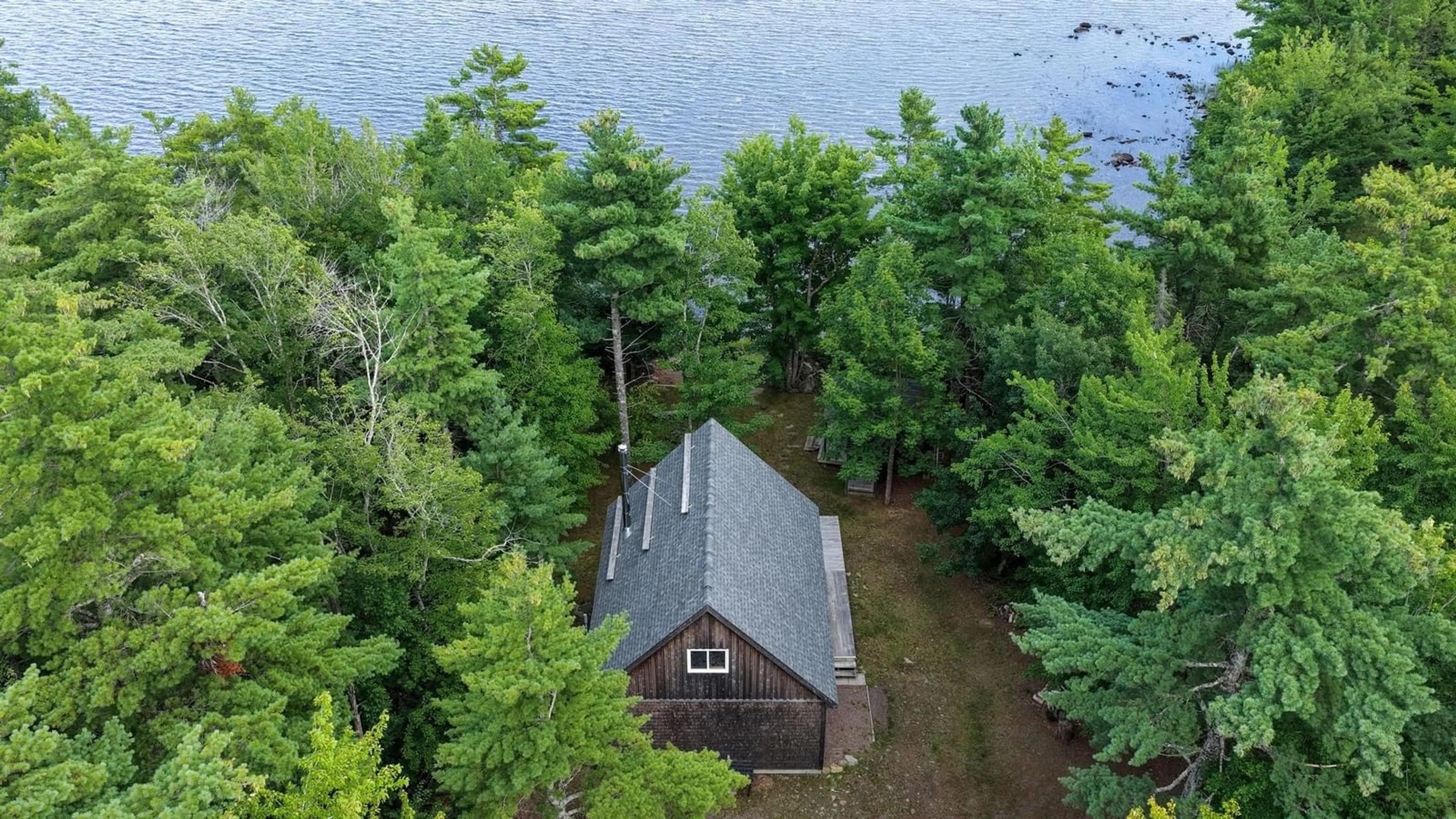 A pic from outside/outdoor area/front of a property/back of a property/a pic from drone, water/lake/river/ocean view for 297 Albion Dr, Middlefield Nova Scotia B0T 1K0