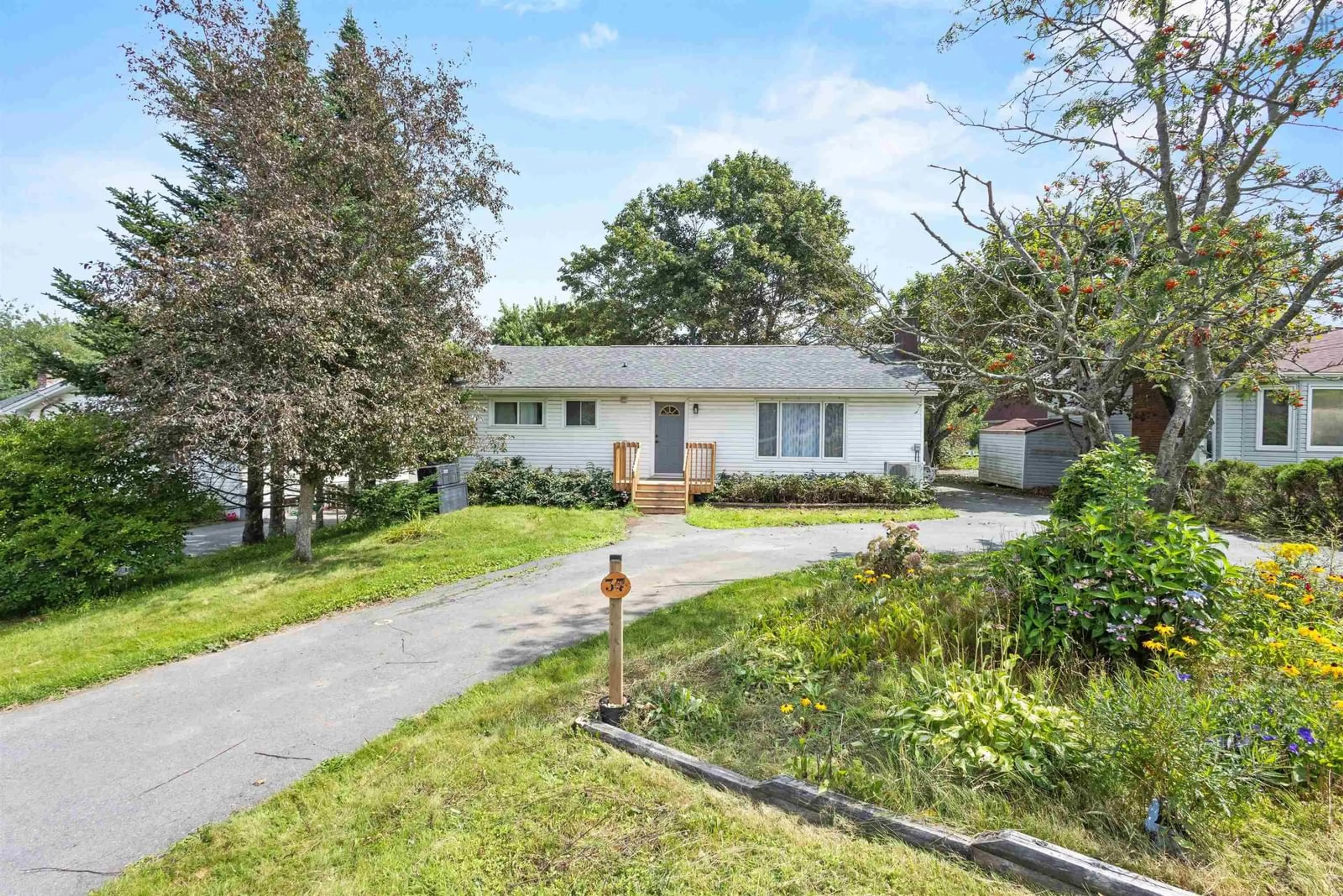 A pic from outside/outdoor area/front of a property/back of a property/a pic from drone, street for 37 Beaver Bank Rd, Lower Sackville Nova Scotia B4E 1G4