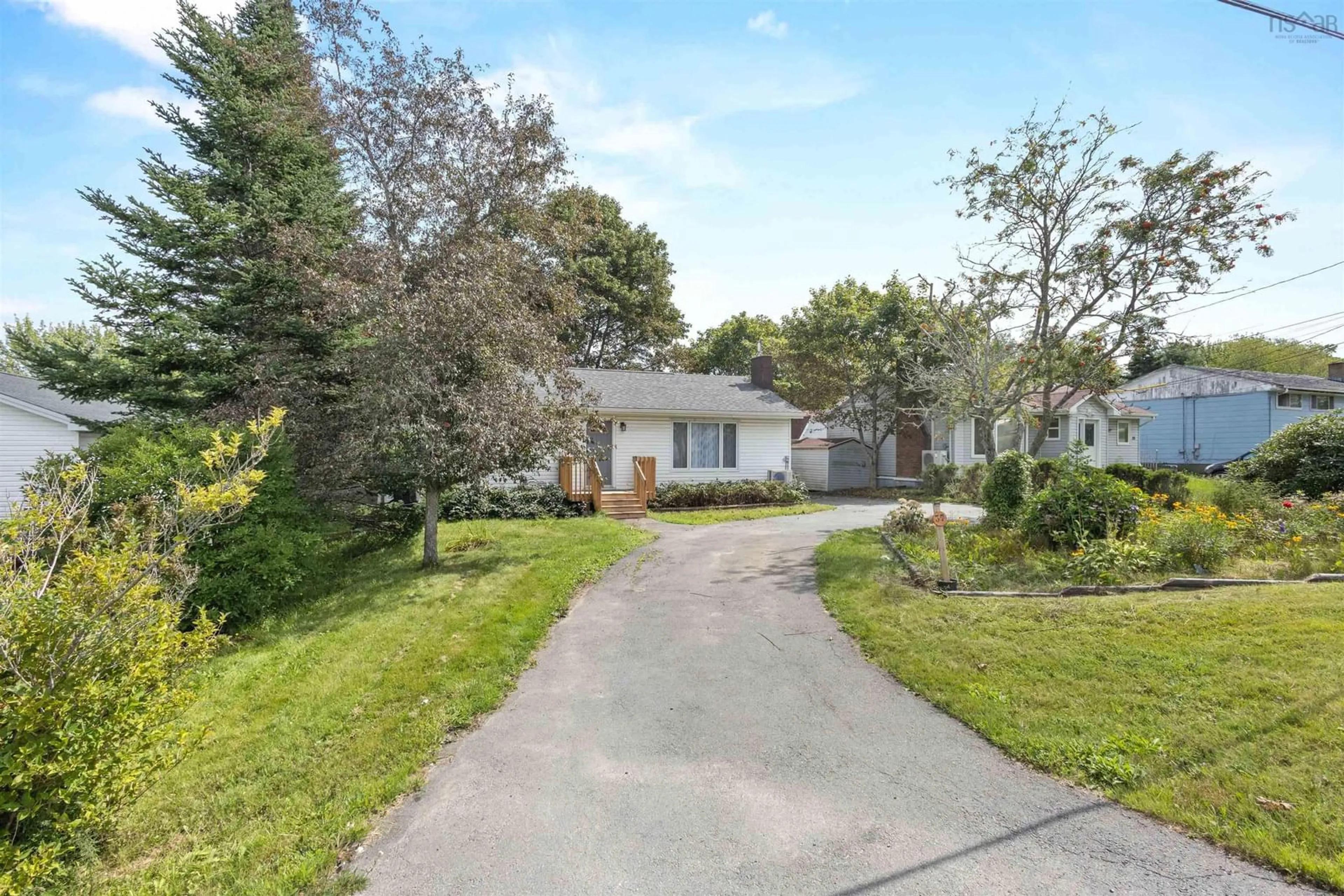 A pic from outside/outdoor area/front of a property/back of a property/a pic from drone, street for 37 Beaver Bank Rd, Lower Sackville Nova Scotia B4E 1G4