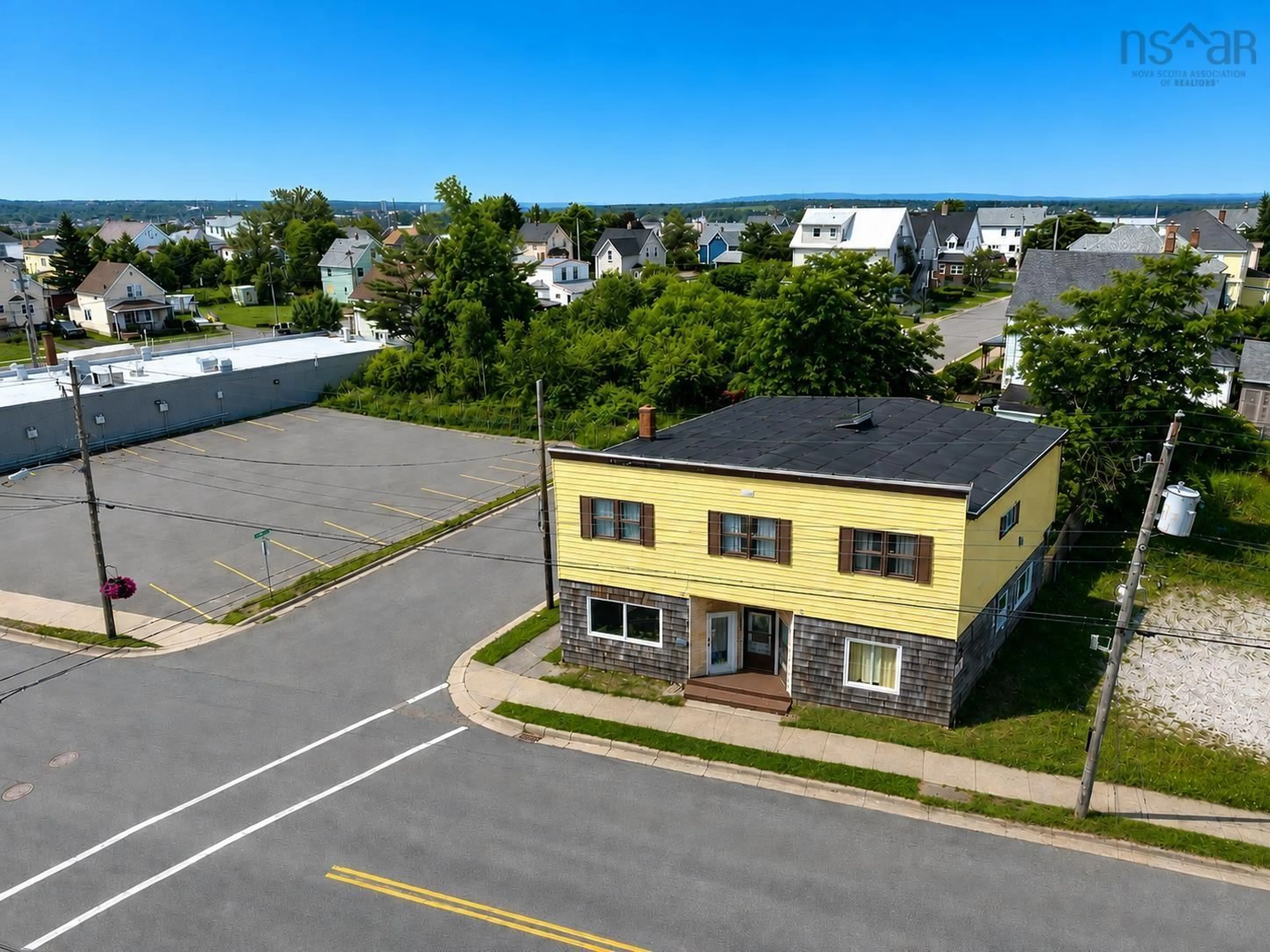 A pic from outside/outdoor area/front of a property/back of a property/a pic from drone, building for 757 Victoria Rd, Sydney Nova Scotia B1N 1J5