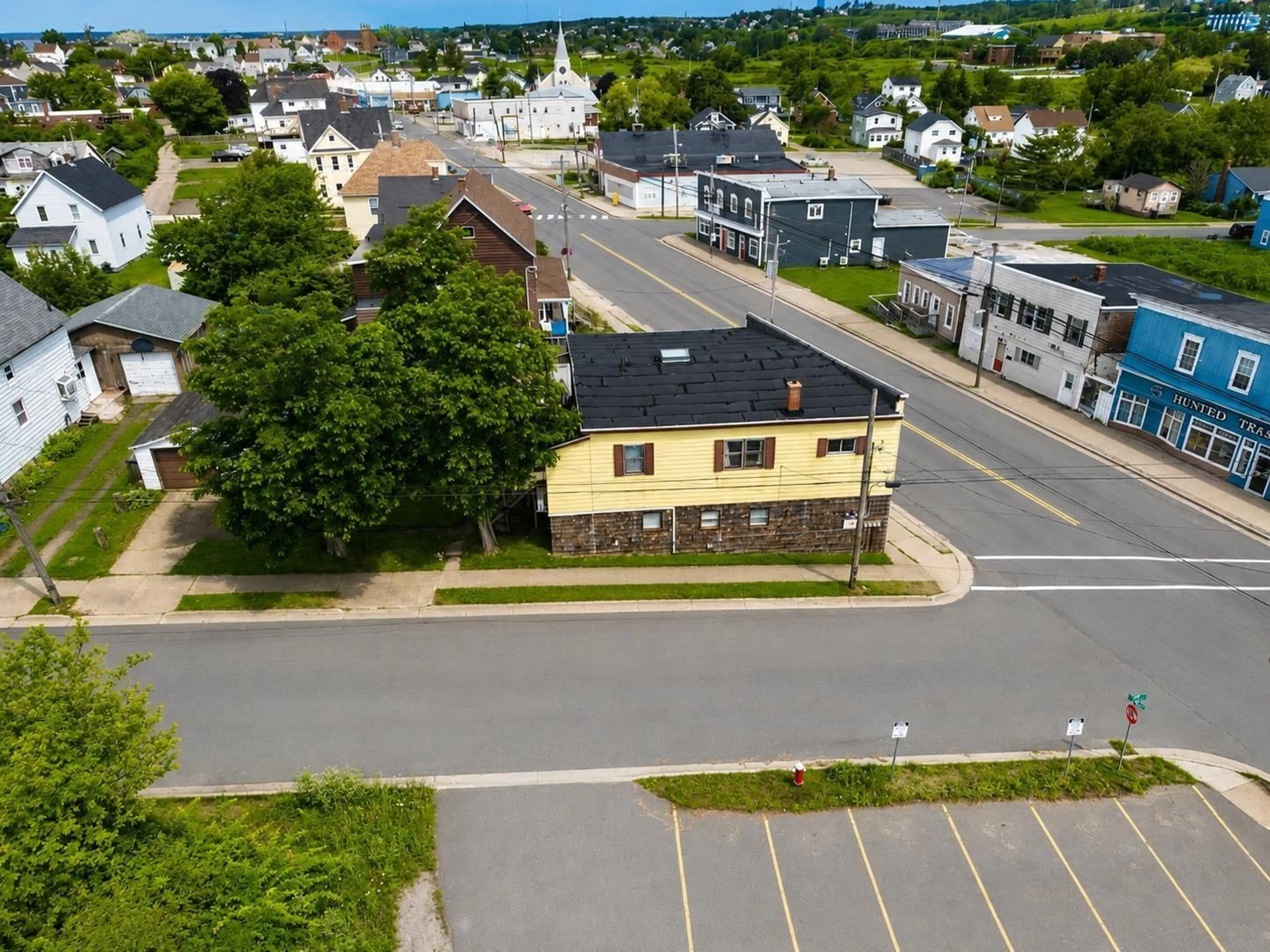 A pic from outside/outdoor area/front of a property/back of a property/a pic from drone, street for 757 Victoria Rd, Sydney Nova Scotia B1N 1J5