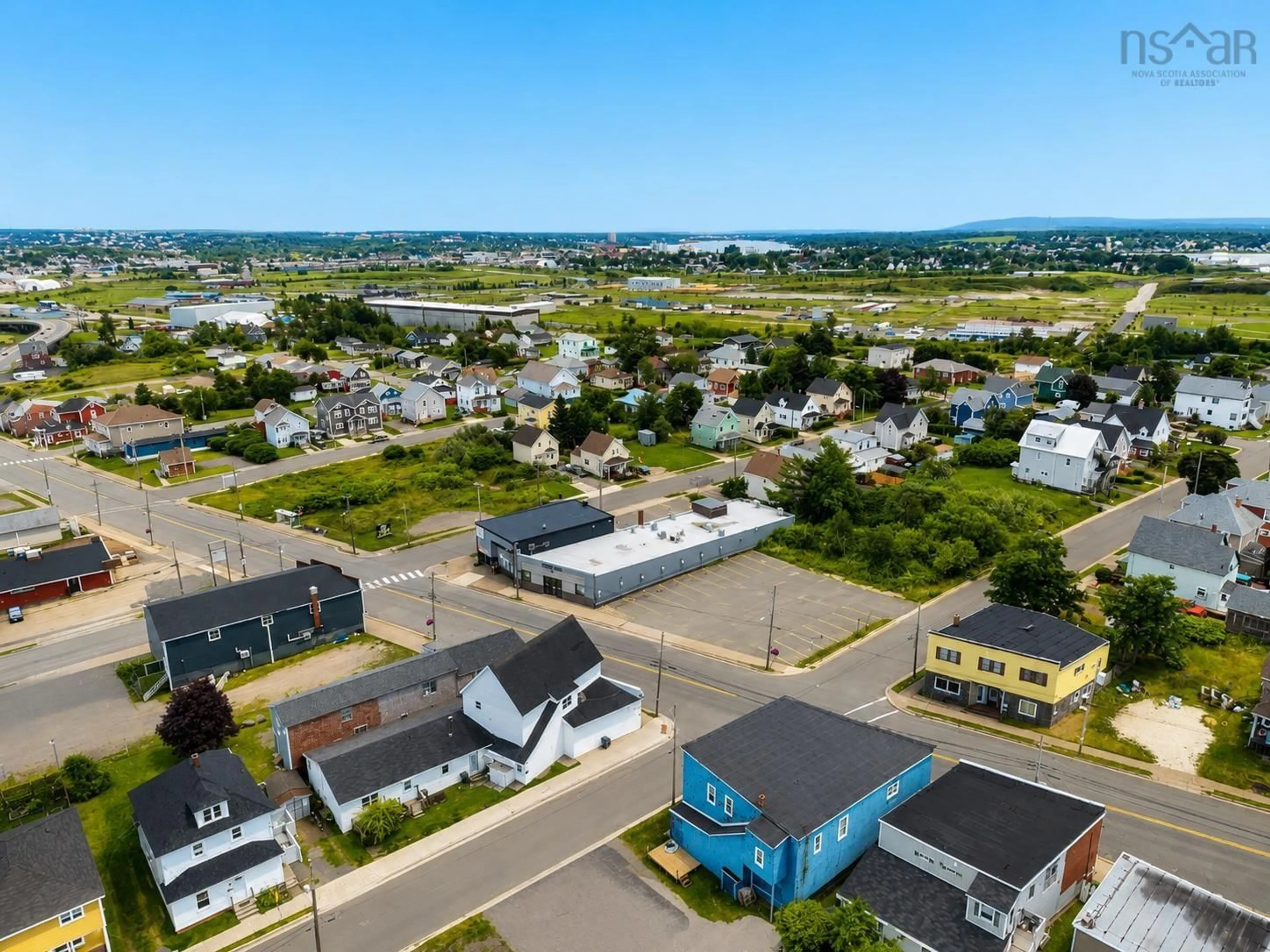 A pic from outside/outdoor area/front of a property/back of a property/a pic from drone, street for 757 Victoria Rd, Sydney Nova Scotia B1N 1J5