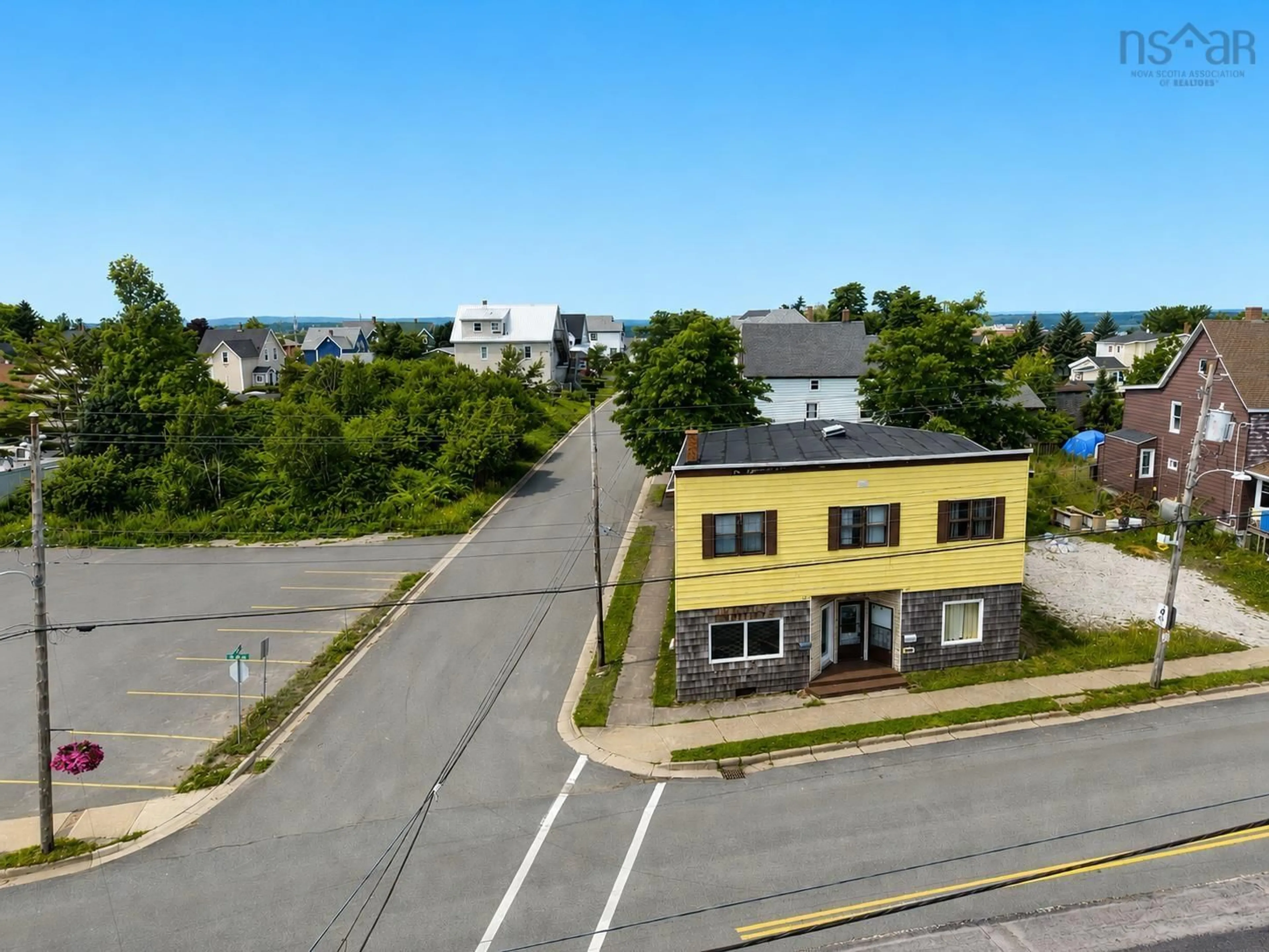 A pic from outside/outdoor area/front of a property/back of a property/a pic from drone, unknown for 757 Victoria Rd, Sydney Nova Scotia B1N 1J5