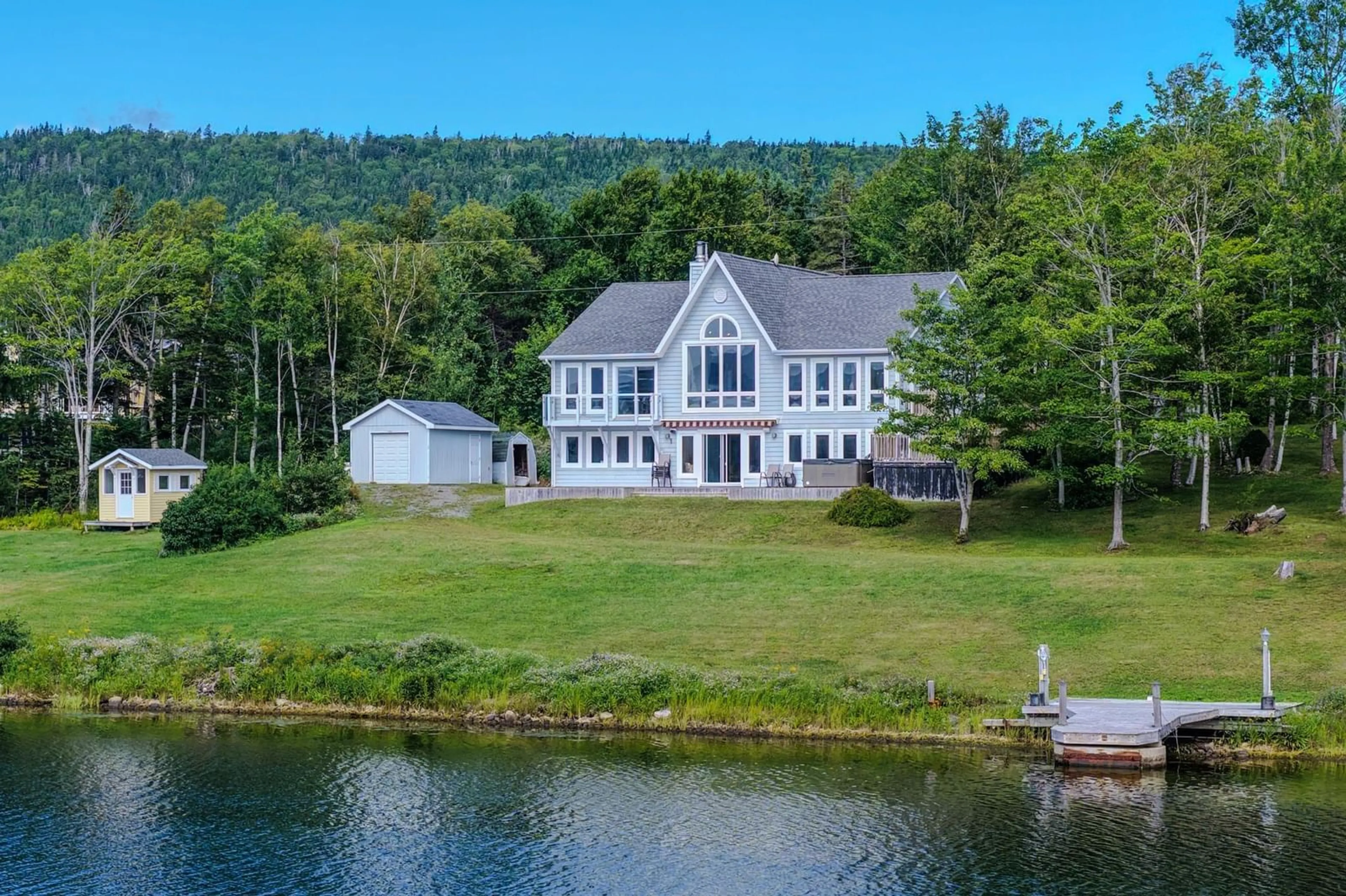 A pic from outside/outdoor area/front of a property/back of a property/a pic from drone, water/lake/river/ocean view for 2339 Eskasoni Rd, Northside East Bay Nova Scotia B1J 1H9