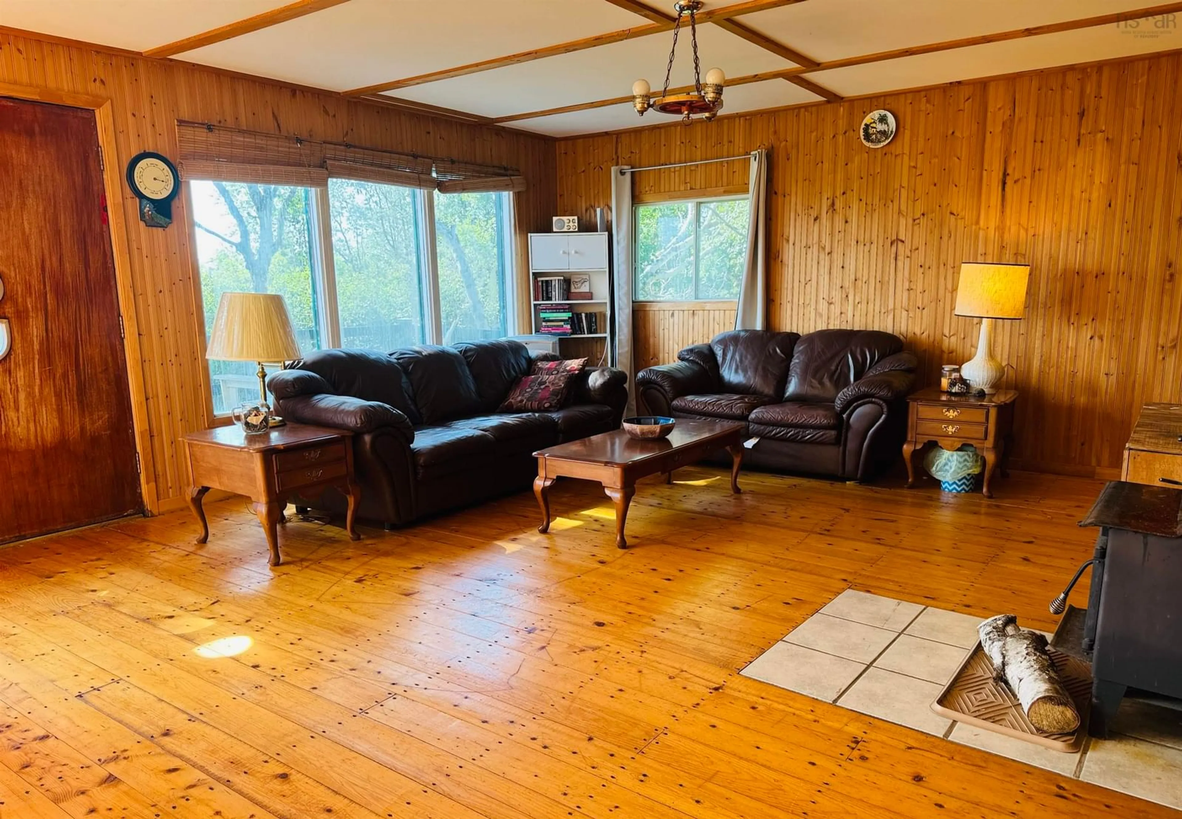 Living room with furniture, wood/laminate floor for 377 Old Farm Rd, Two Islands Nova Scotia B0M 1S0