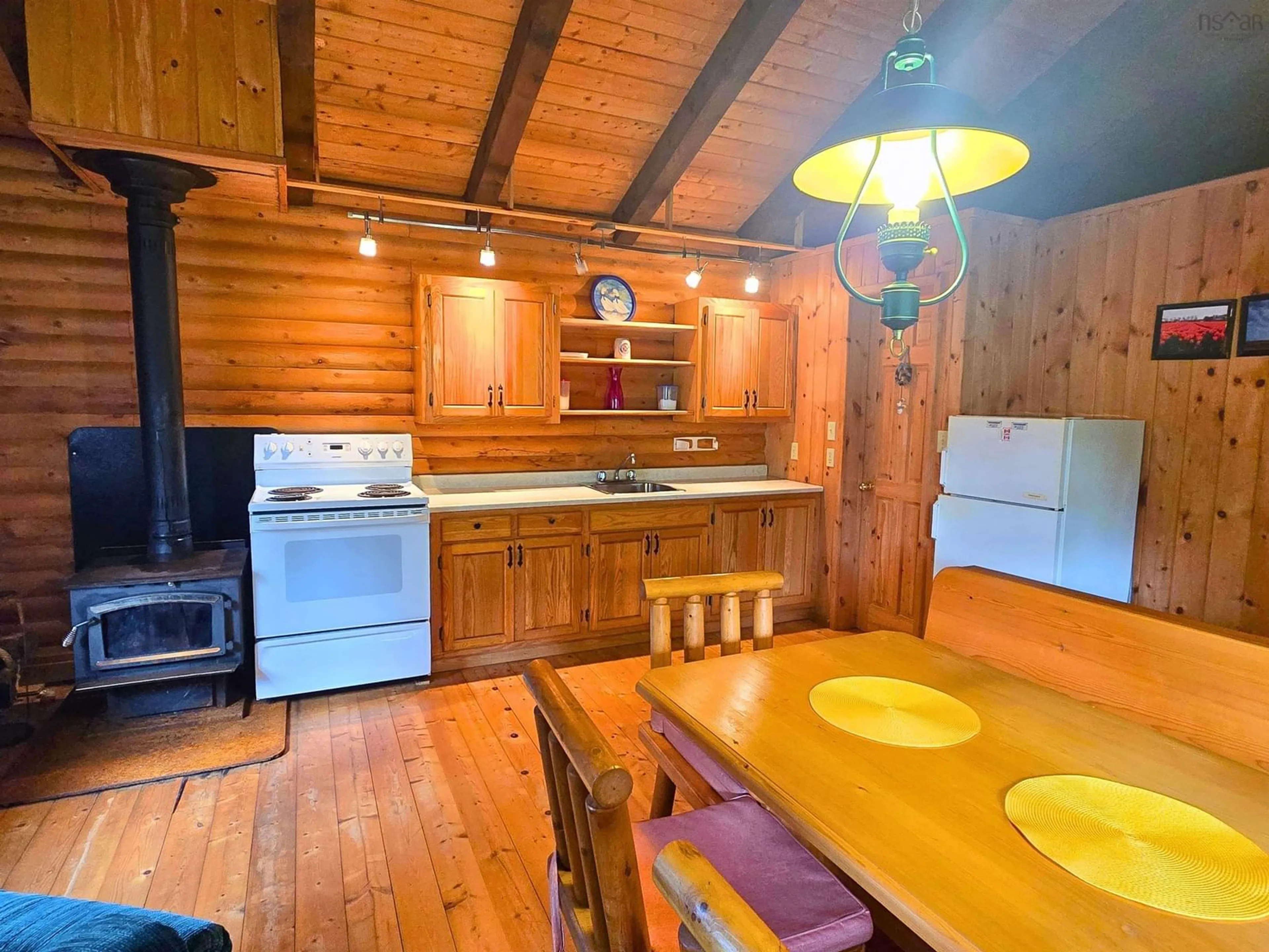 Standard kitchen, wood/laminate floor for 21 Lakefront Dr, Loch Lomond Nova Scotia B2E 1B3