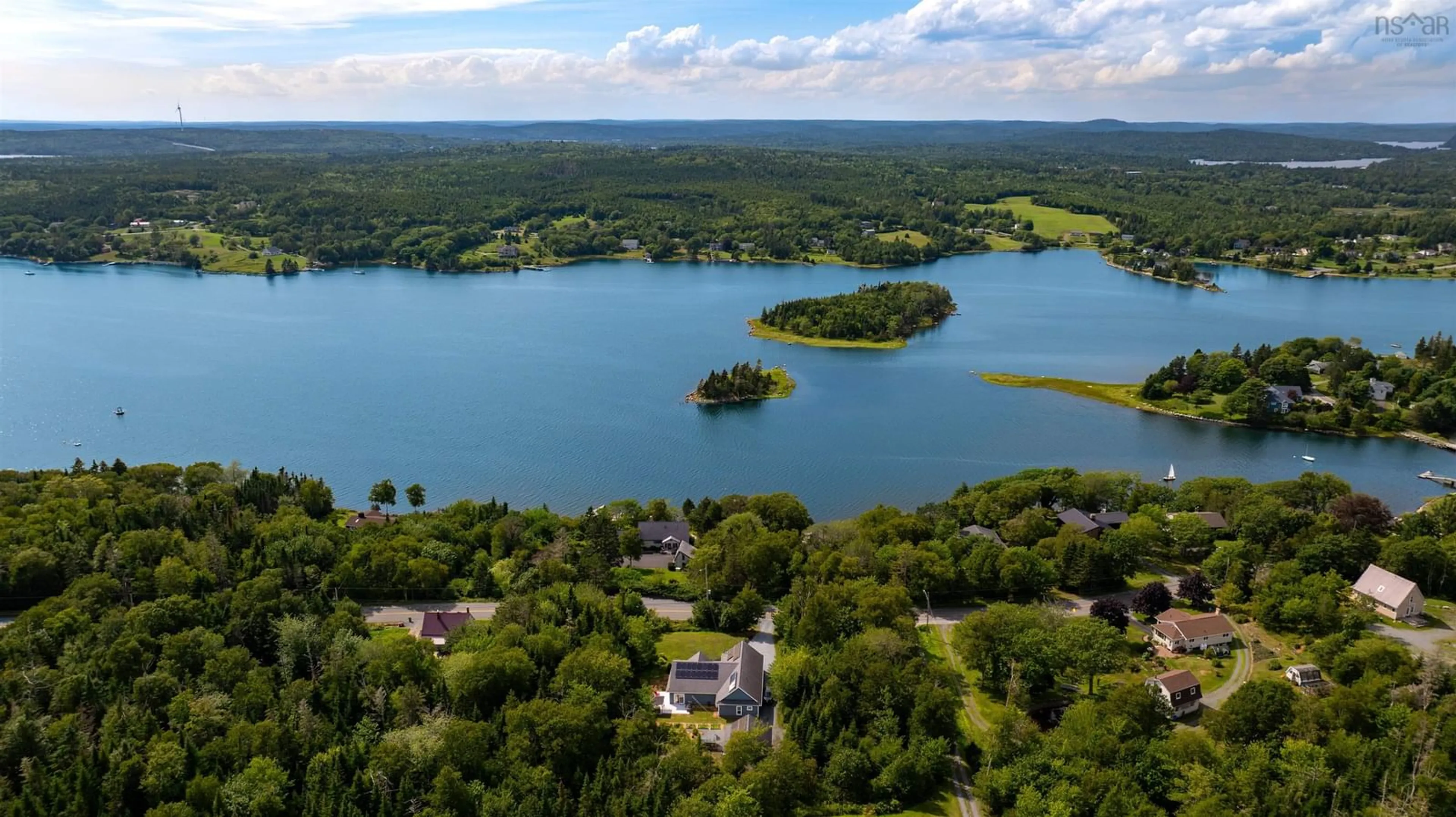 A pic from outside/outdoor area/front of a property/back of a property/a pic from drone, water/lake/river/ocean view for 345 East Petpeswick Rd, East Petpeswick Nova Scotia B0J 2L0