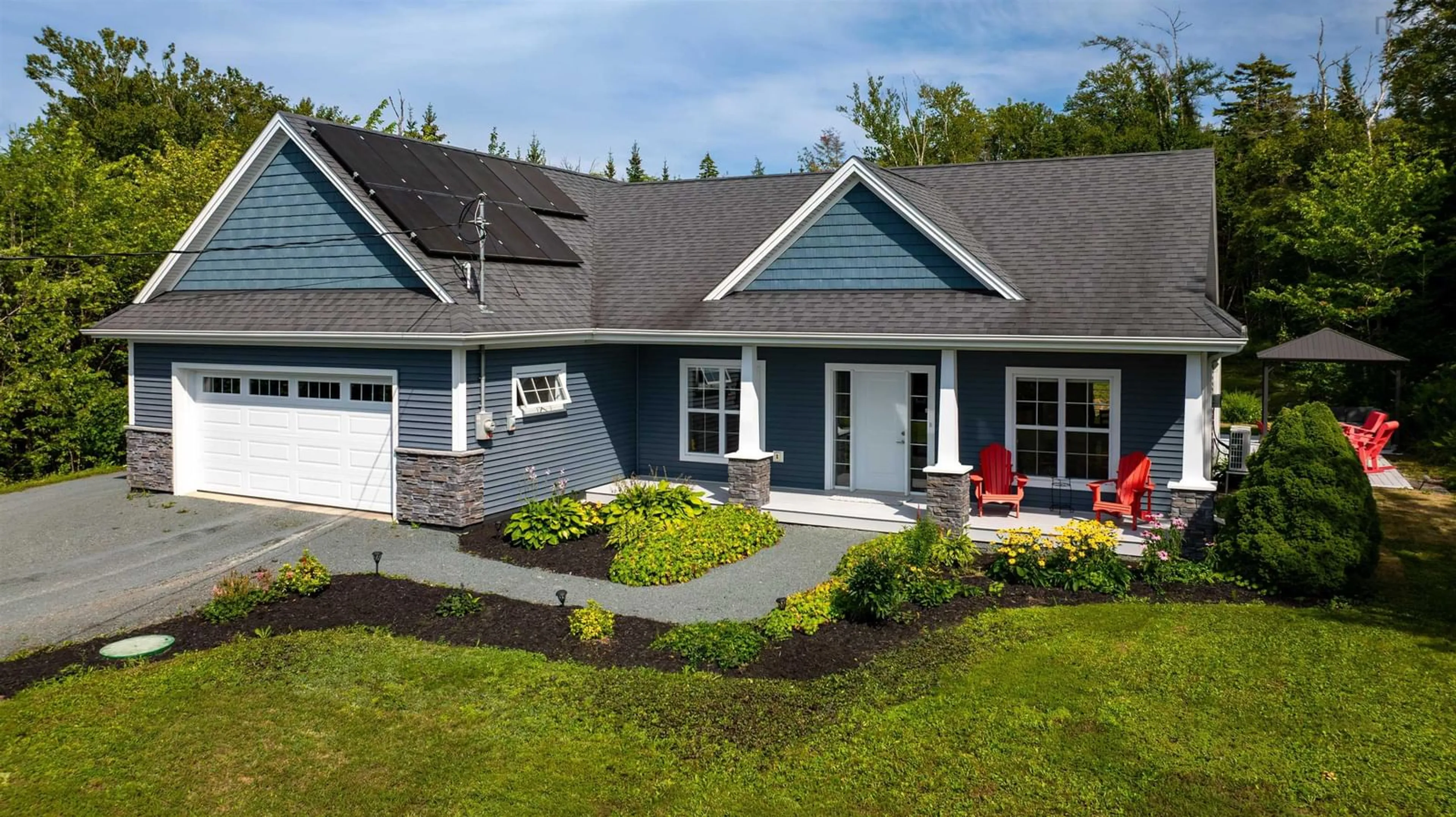 Home with vinyl exterior material, street for 345 East Petpeswick Rd, East Petpeswick Nova Scotia B0J 2L0