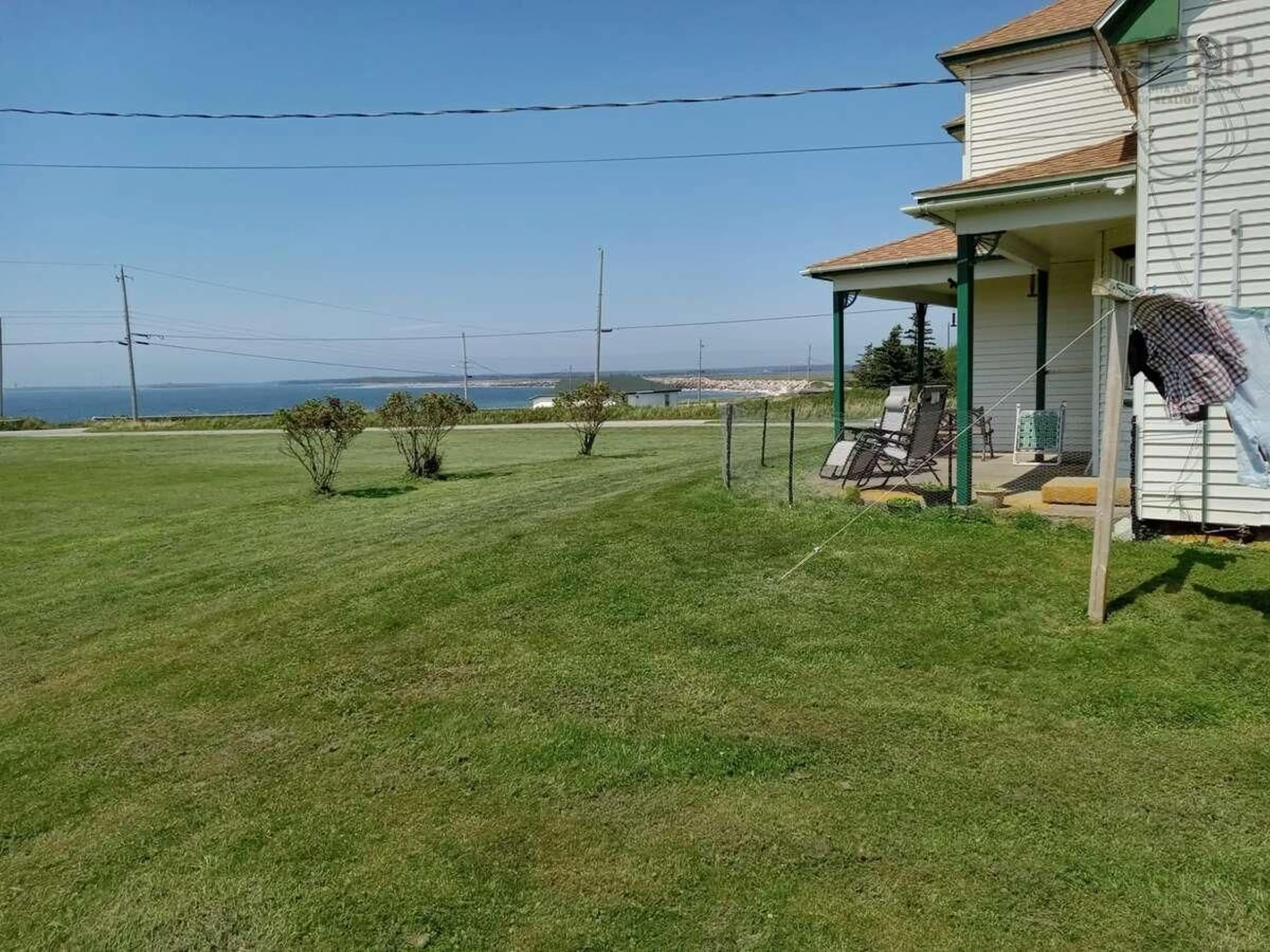 A pic from outside/outdoor area/front of a property/back of a property/a pic from drone, water/lake/river/ocean view for 12 Ripine Lane, Pinkneys Point Nova Scotia B0W 1B0