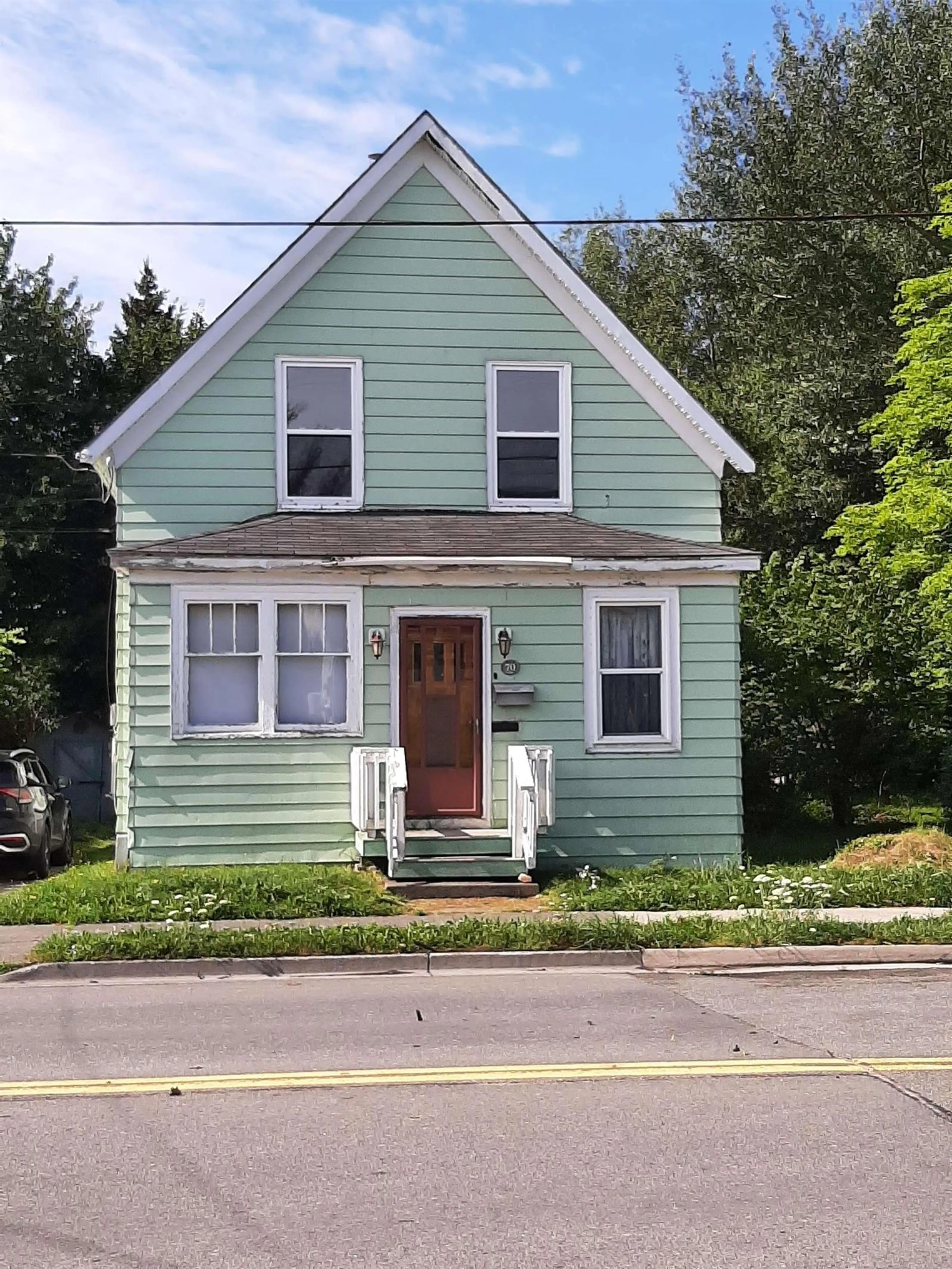 Home with vinyl exterior material, street for 70 King St, North Sydney Nova Scotia B2A 2T4