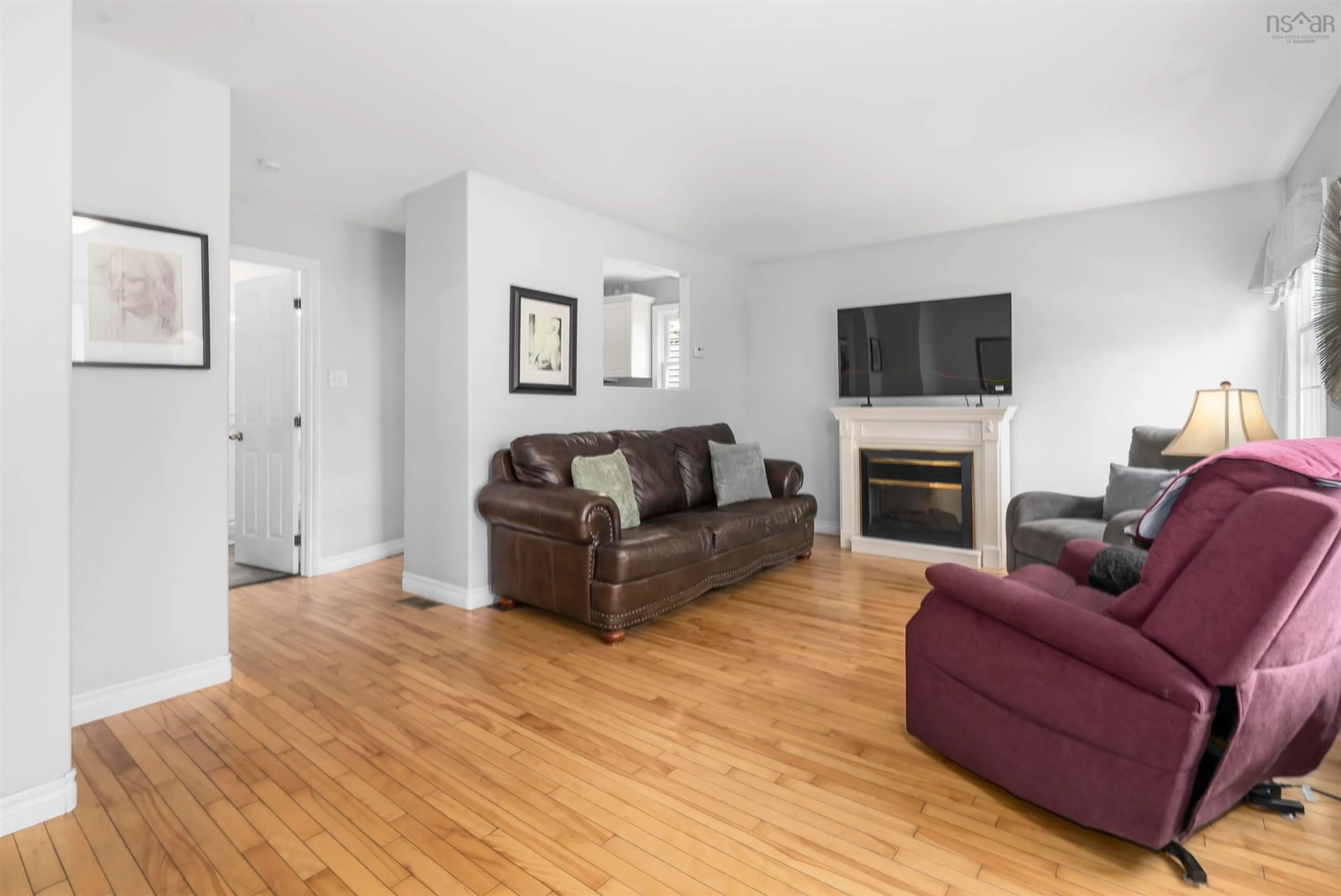 Living room with furniture, wood/laminate floor for 3206 Micmac St, Halifax Nova Scotia B3L 3W4
