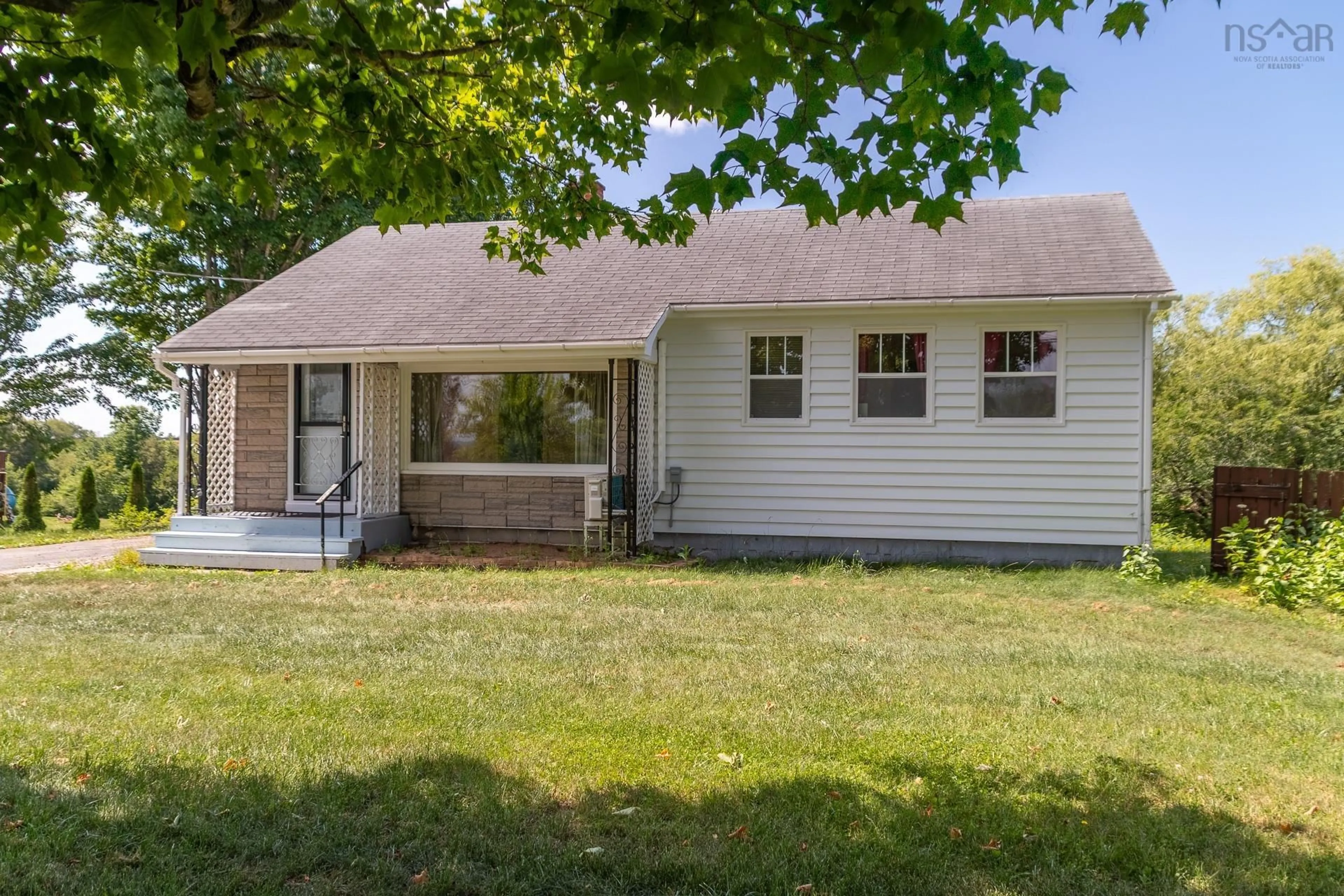 Home with vinyl exterior material, street for 1549 Victoria Rd, Dempseys Corner Nova Scotia B0P 1C0
