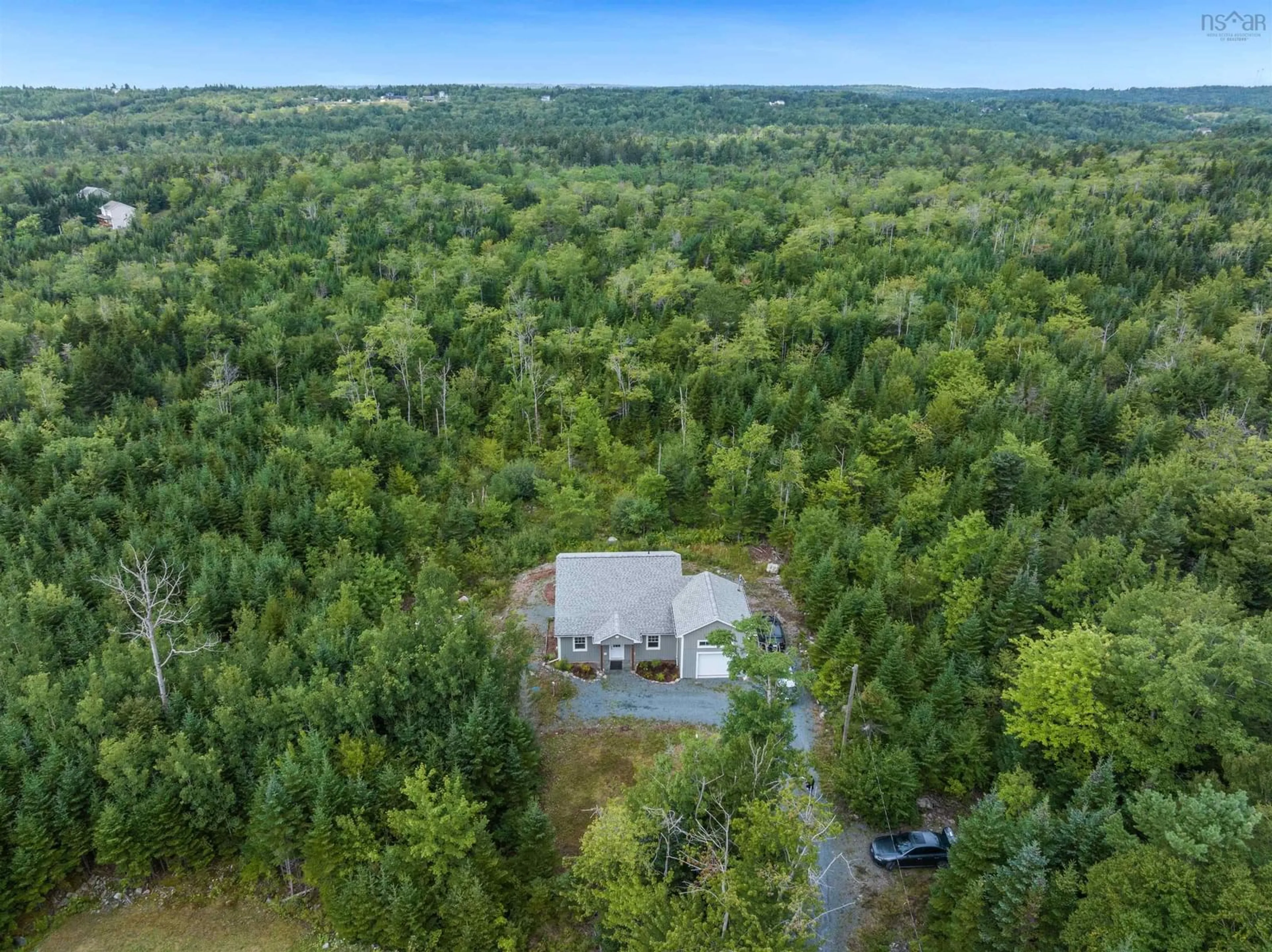 A pic from outside/outdoor area/front of a property/back of a property/a pic from drone, forest/trees view for 111 Mineville Rd, East Preston Nova Scotia B2Z 1K4