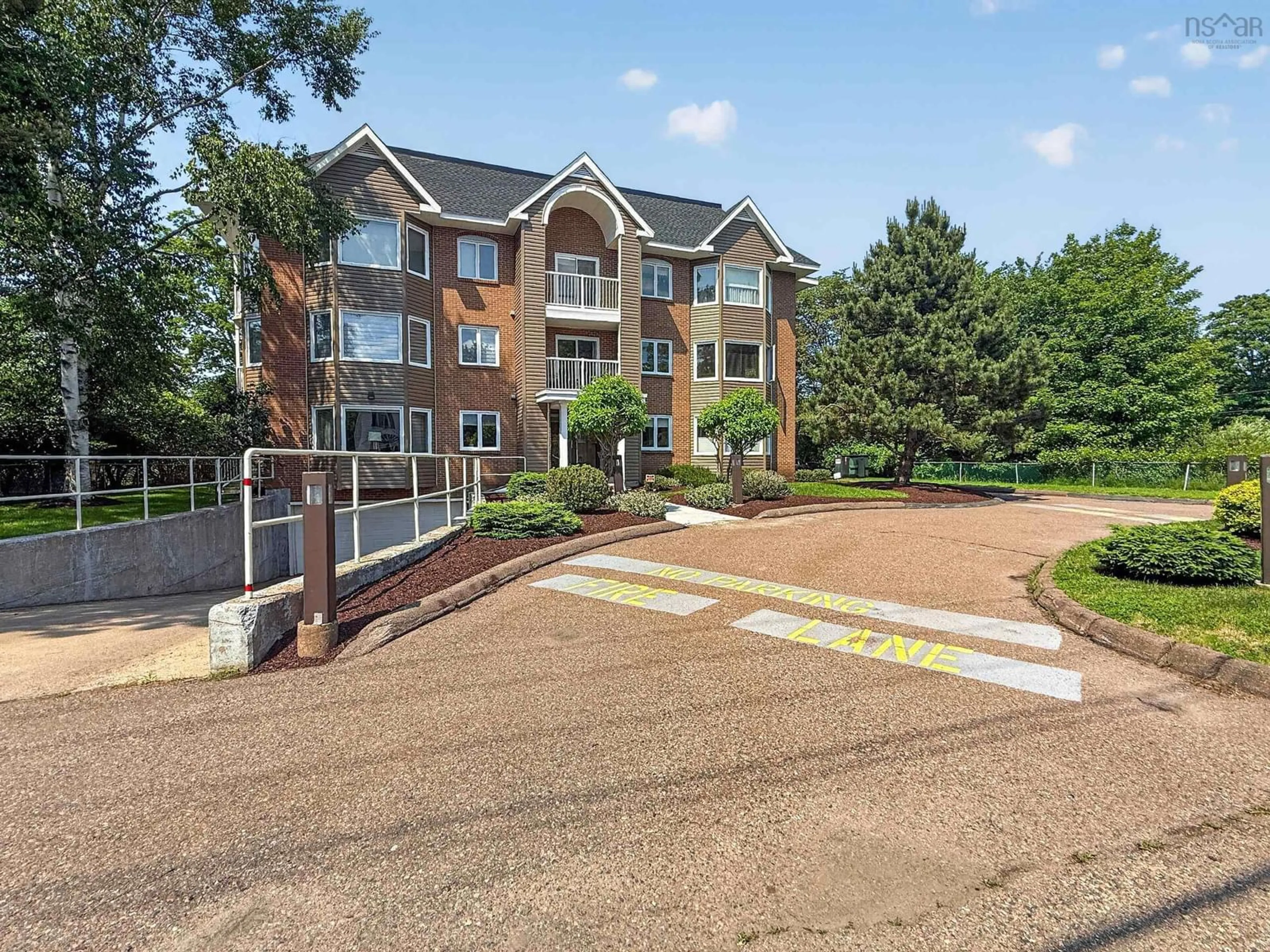 A pic from outside/outdoor area/front of a property/back of a property/a pic from drone, water/lake/river/ocean view for 403 Prince St #201, Truro Nova Scotia B2N 1E6