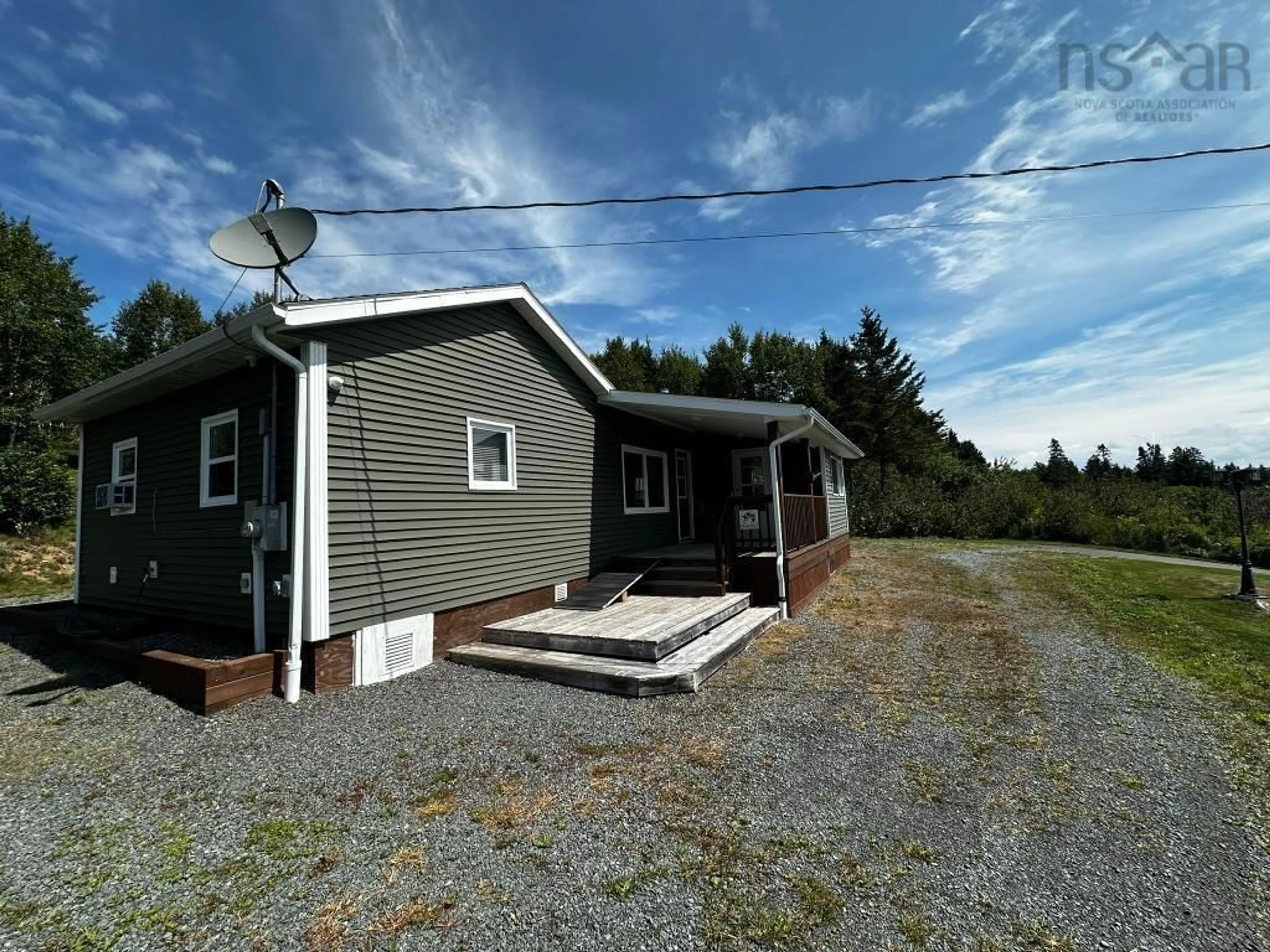 A pic from outside/outdoor area/front of a property/back of a property/a pic from drone, building for 1079 Cape Split Rd, Scots Bay Nova Scotia B0P 1H0