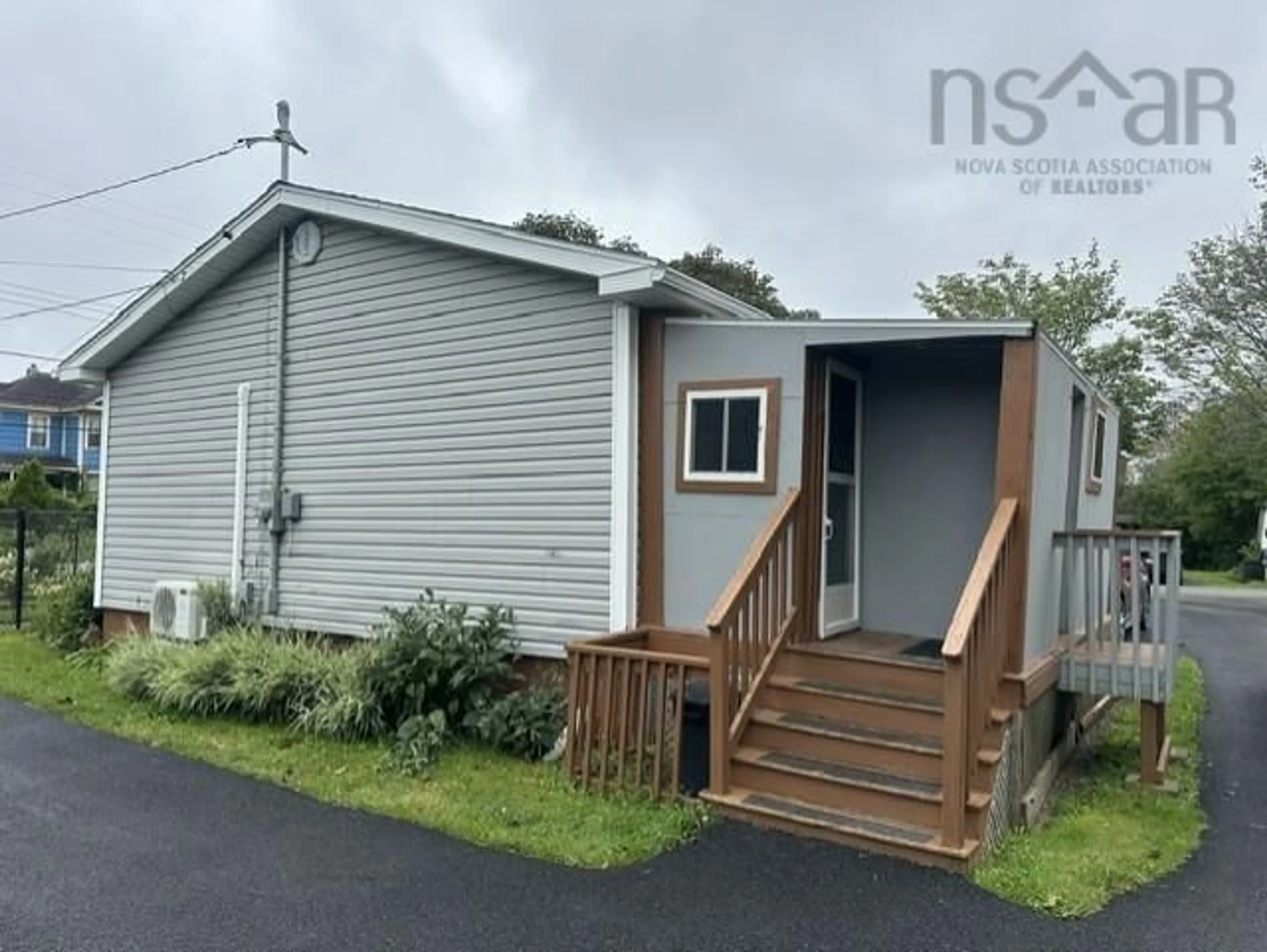 Home with vinyl exterior material, street for 2064 South Main St, Westville Nova Scotia B0K 2A0