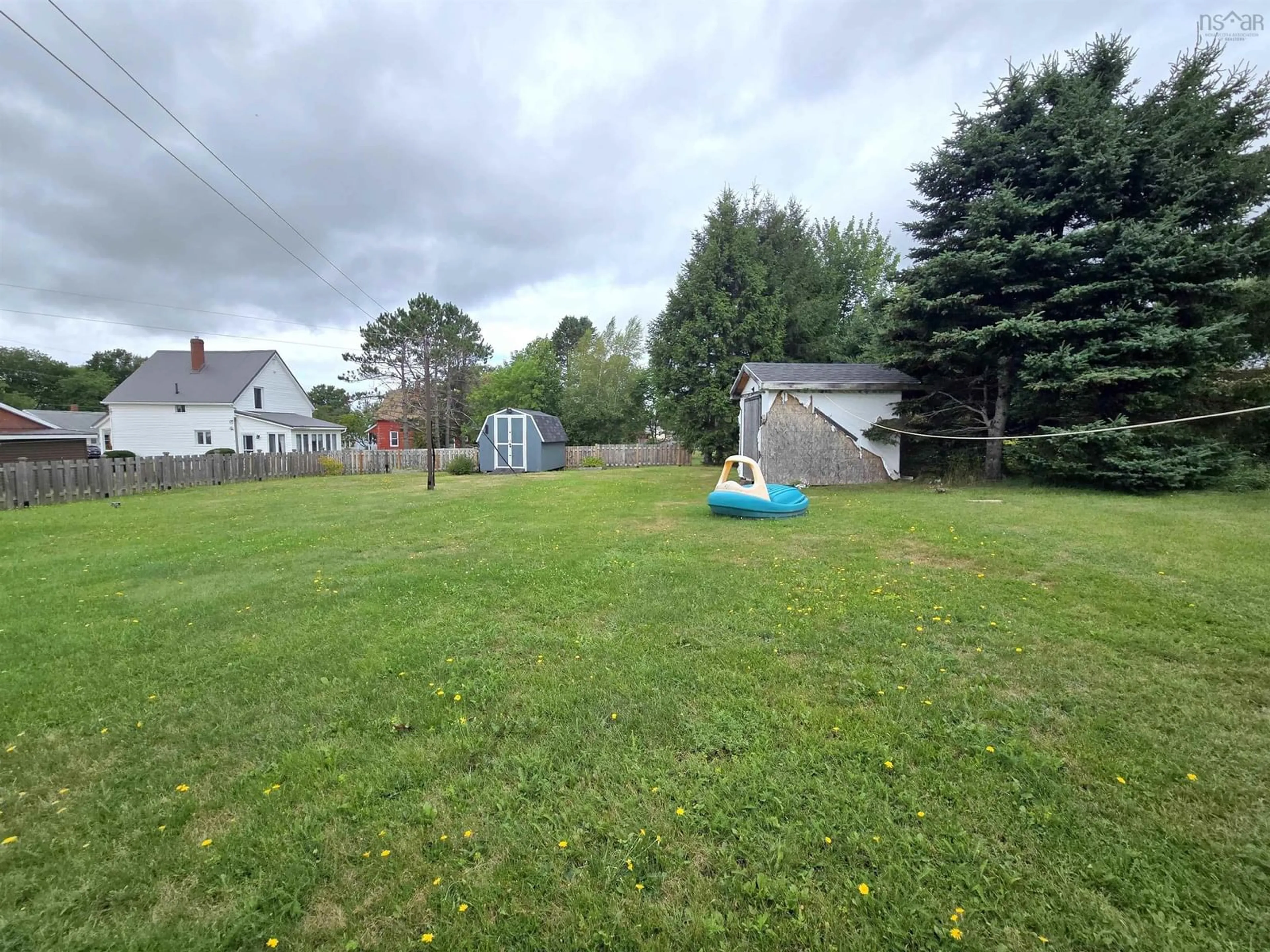 A pic from outside/outdoor area/front of a property/back of a property/a pic from drone, unknown for 32 Poplar St, Amherst Nova Scotia B4H 1L7