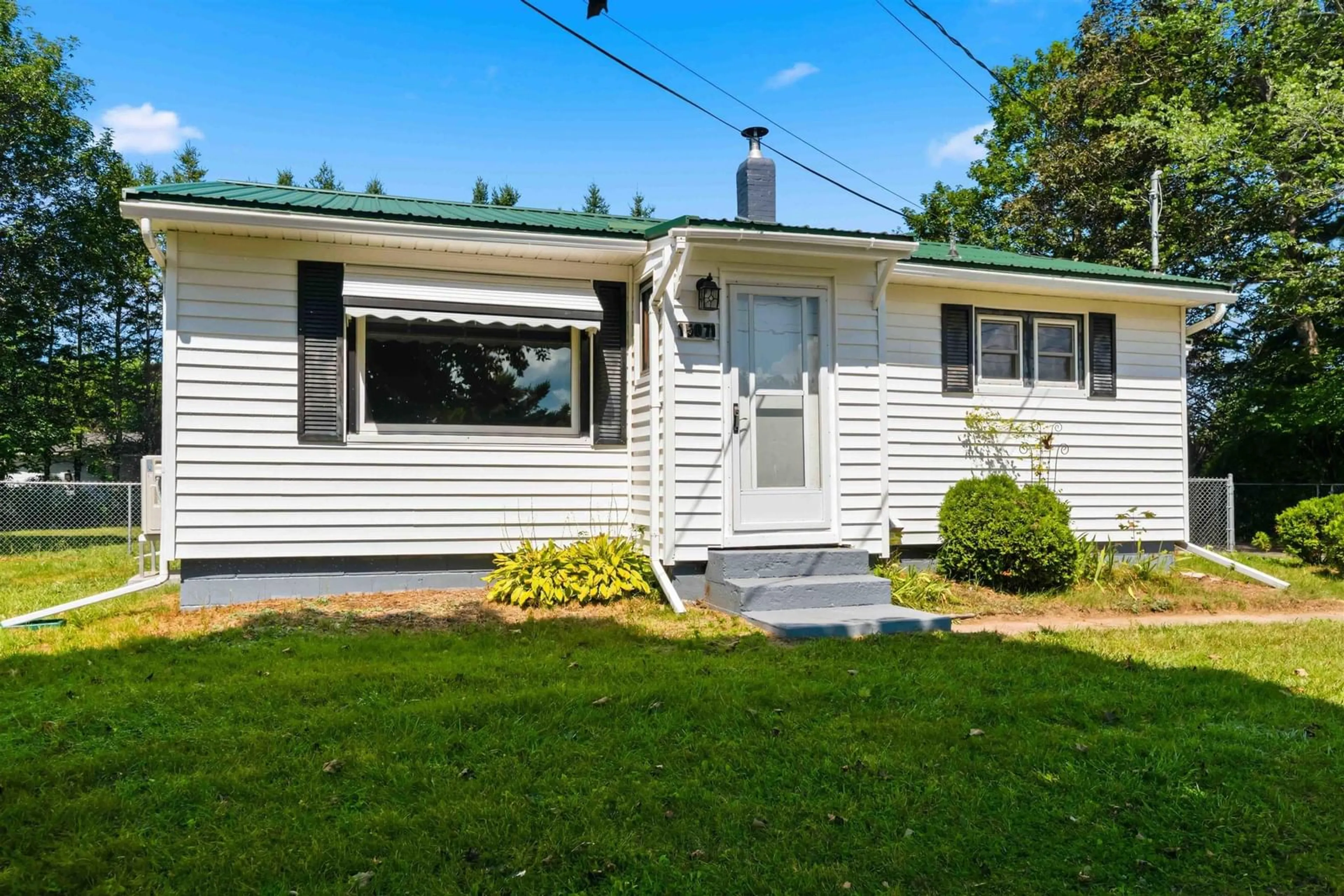 Home with vinyl exterior material, street for 15071 Highway 1, Wilmot Nova Scotia B0P 1W0