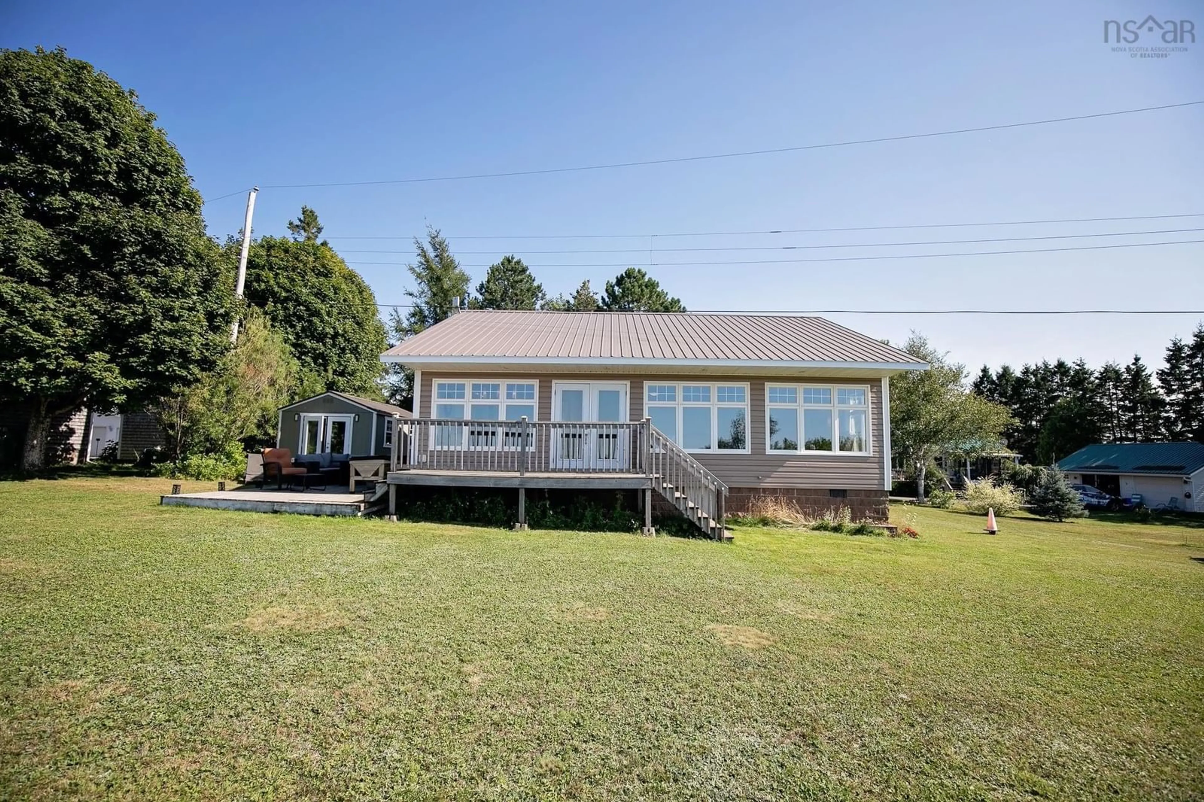 A pic from outside/outdoor area/front of a property/back of a property/a pic from drone, water/lake/river/ocean view for 14 Roy Haines Lane, Amherst Shore Nova Scotia B0L 1E0