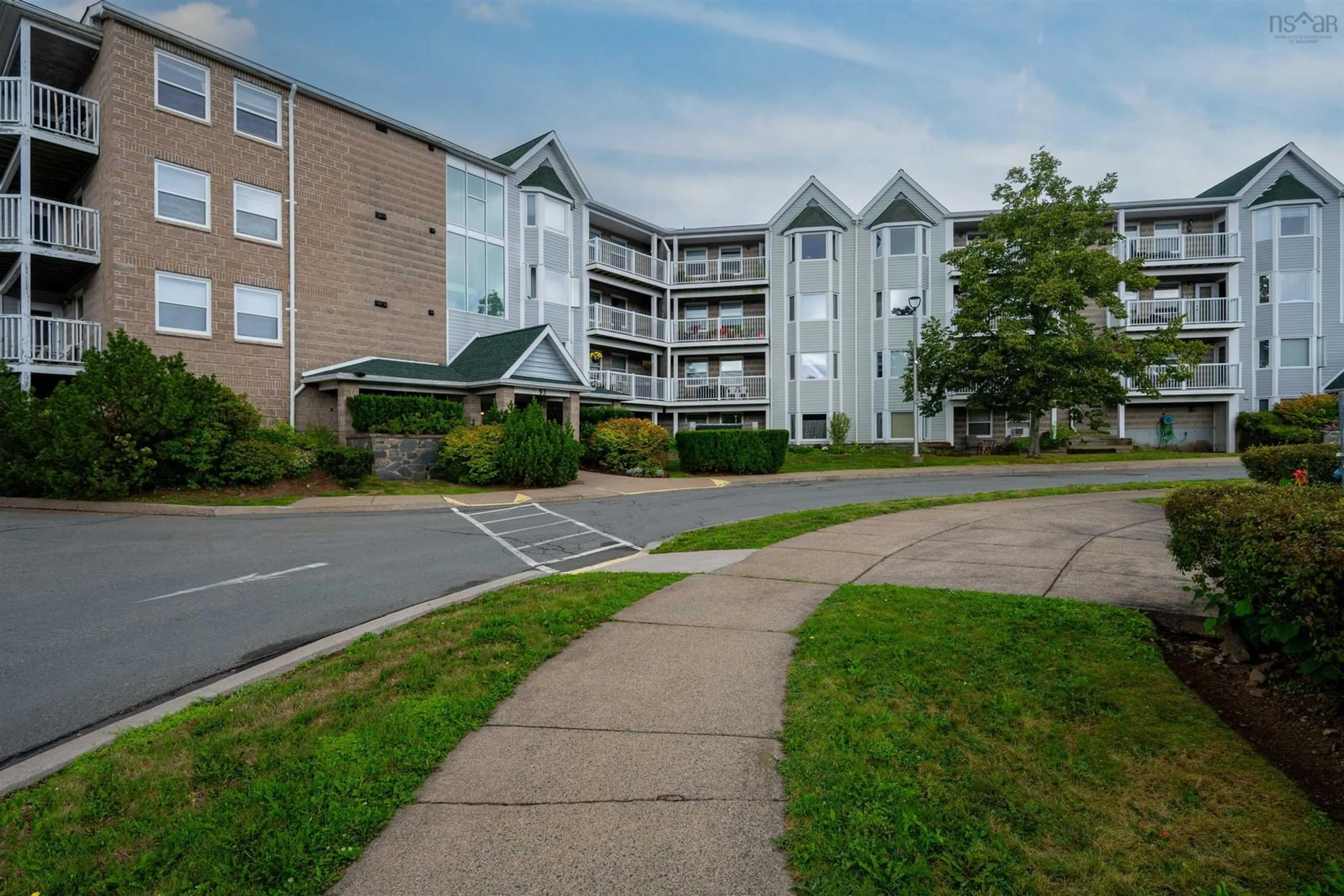 A pic from outside/outdoor area/front of a property/back of a property/a pic from drone, unknown for 93 Kearney Lake Rd #305, Halifax Nova Scotia B3M 4E7