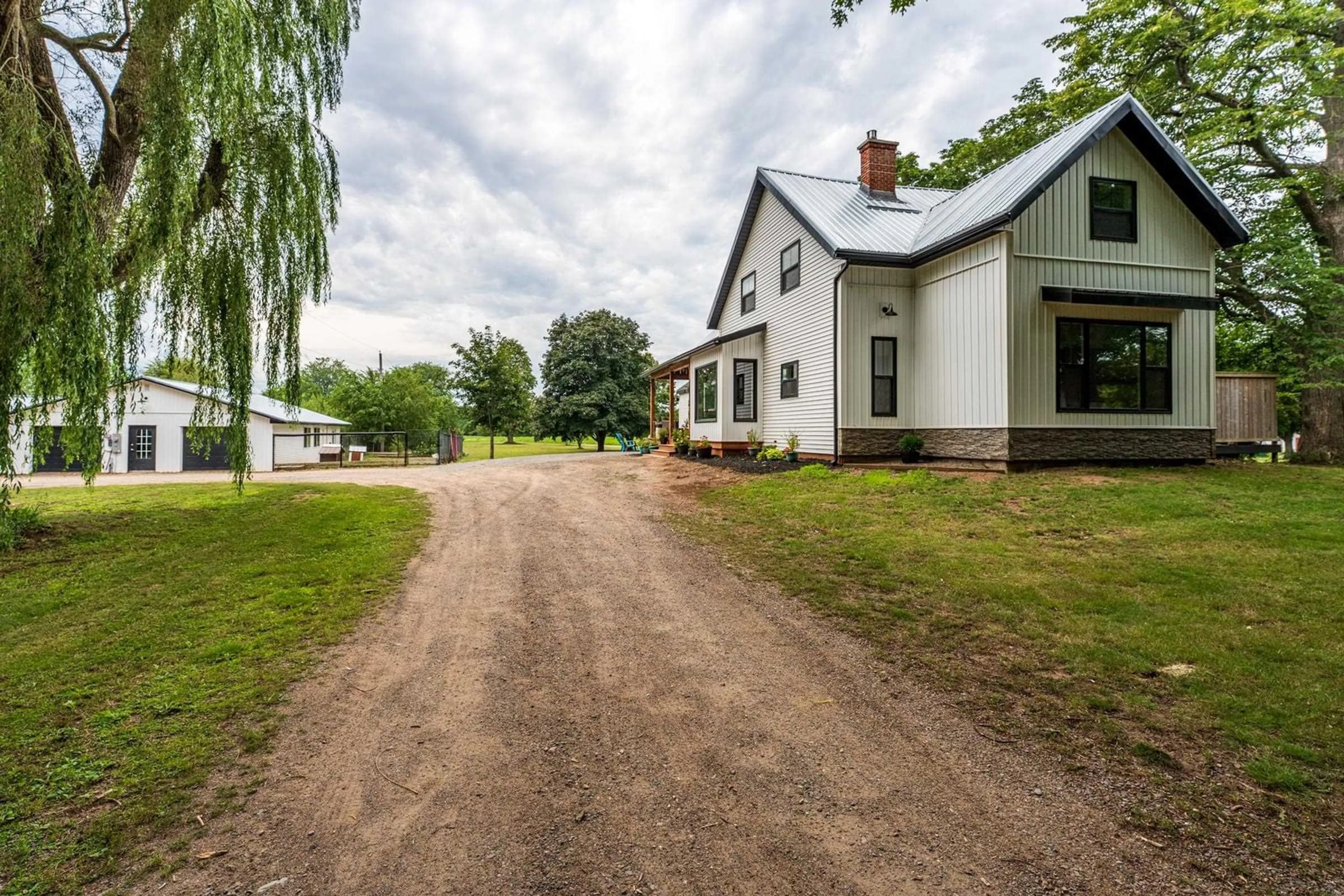 A pic from outside/outdoor area/front of a property/back of a property/a pic from drone, street for 997 Maple Avenue, Aylesford Nova Scotia B0P 1C0