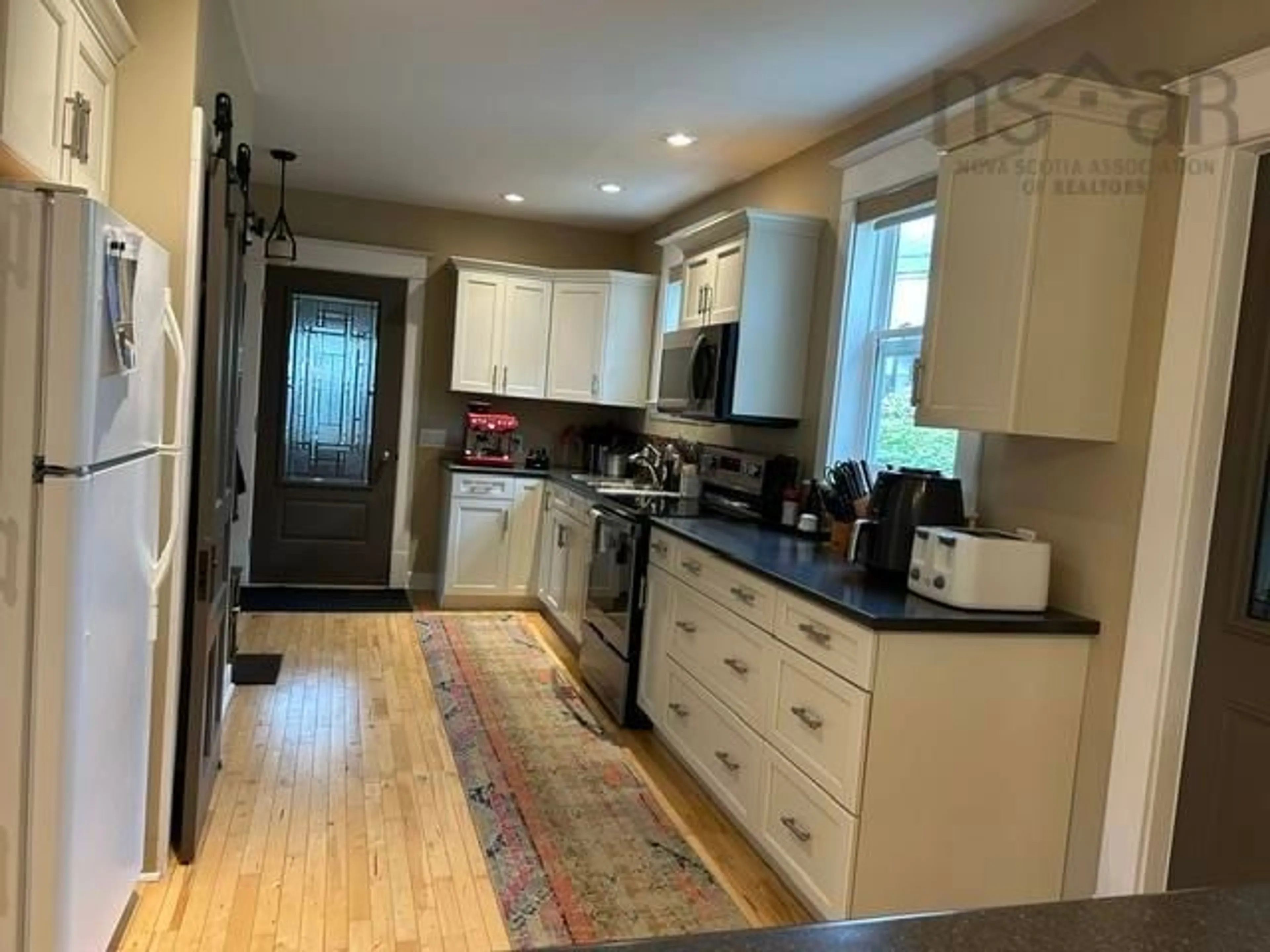 Open concept kitchen, unknown for 26 Pitt St, Port Hawkesbury Nova Scotia B9A 2T3