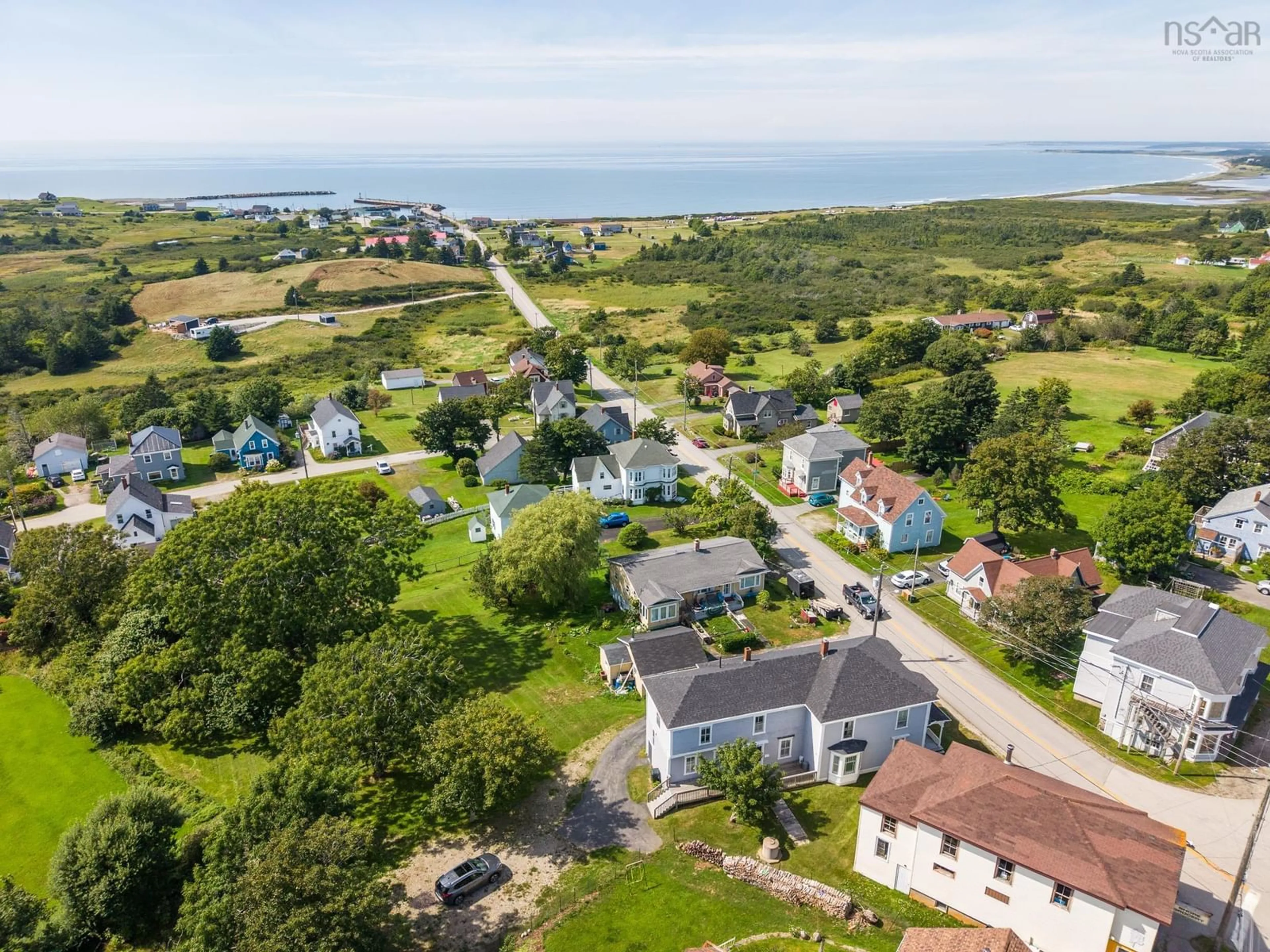 A pic from outside/outdoor area/front of a property/back of a property/a pic from drone, street for 3414 Main Shore Rd, Port Maitland Nova Scotia B5A 5V6