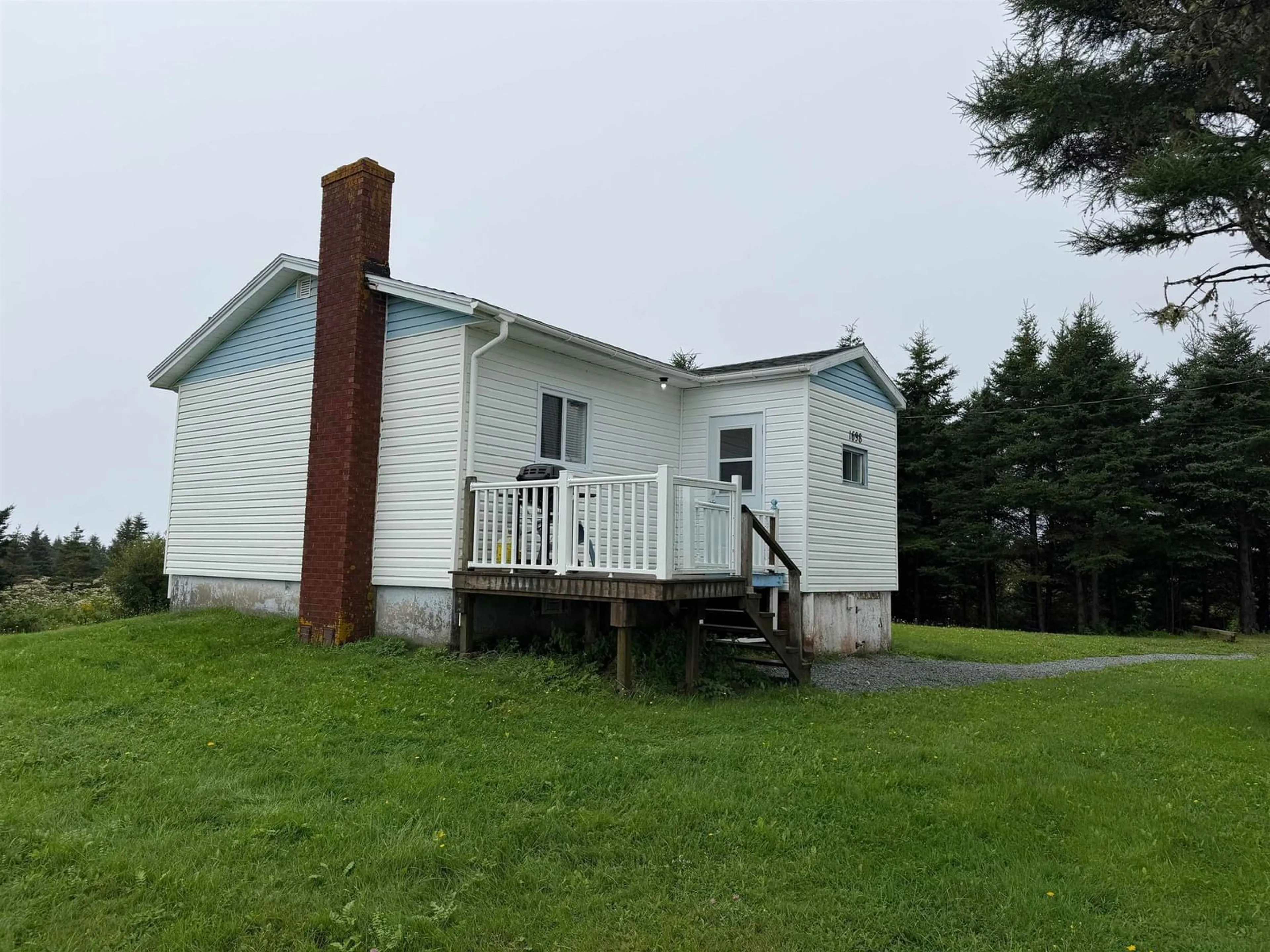 A pic from outside/outdoor area/front of a property/back of a property/a pic from drone, building for 1698 Highway 247, L'Ardoise Nova Scotia B0E 1S0
