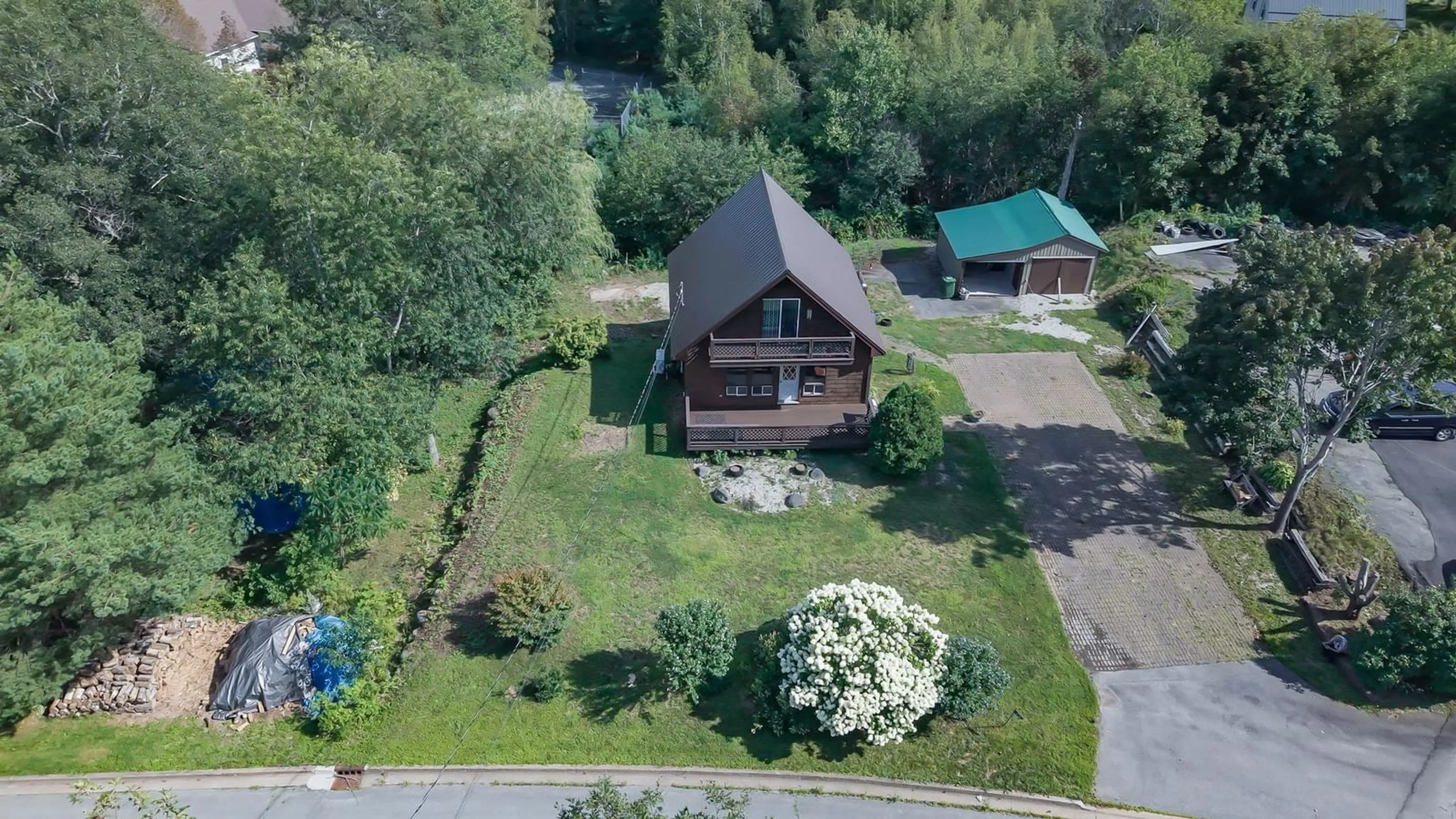 A pic from outside/outdoor area/front of a property/back of a property/a pic from drone, unknown for 27 Riverview Dr, Bridgewater Nova Scotia B4V 3A1