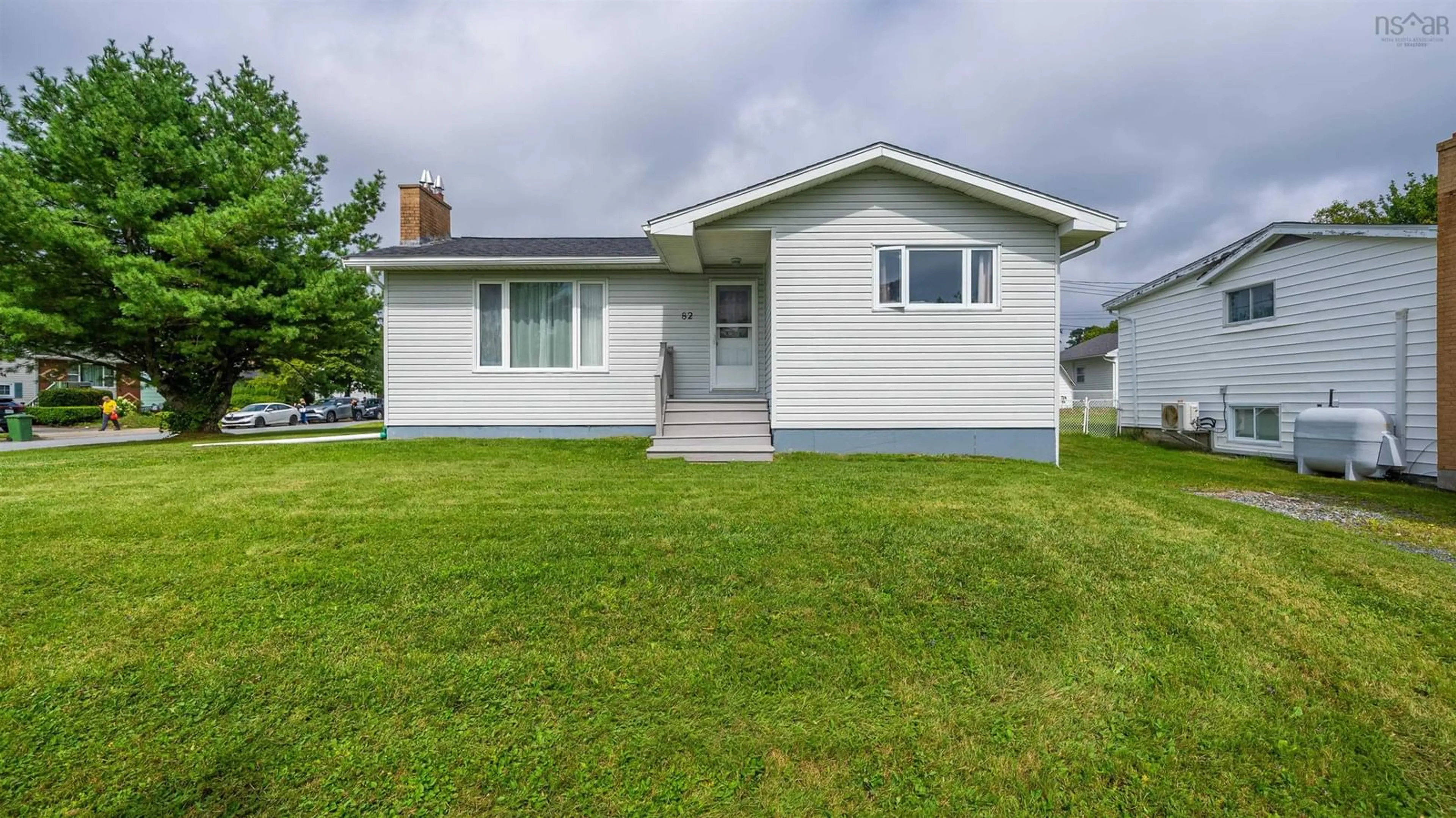 Home with vinyl exterior material, street for 82 Nappan Dr, Lower Sackville Nova Scotia B4C 2E3