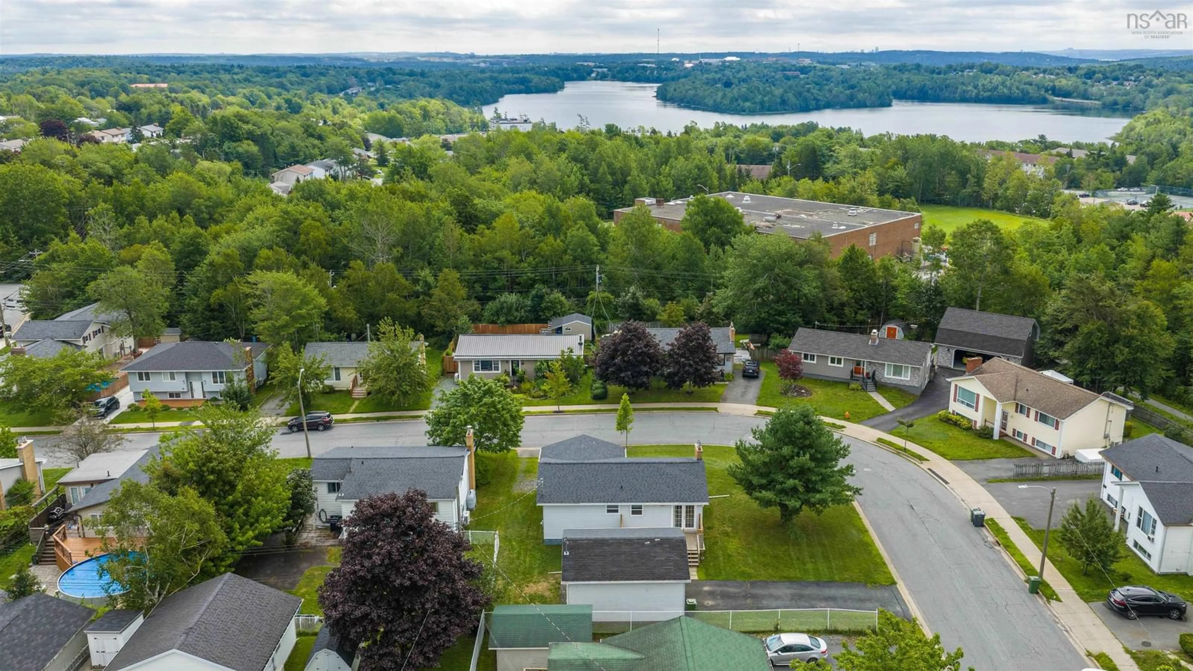 A pic from outside/outdoor area/front of a property/back of a property/a pic from drone, water/lake/river/ocean view for 82 Nappan Dr, Lower Sackville Nova Scotia B4C 2E3
