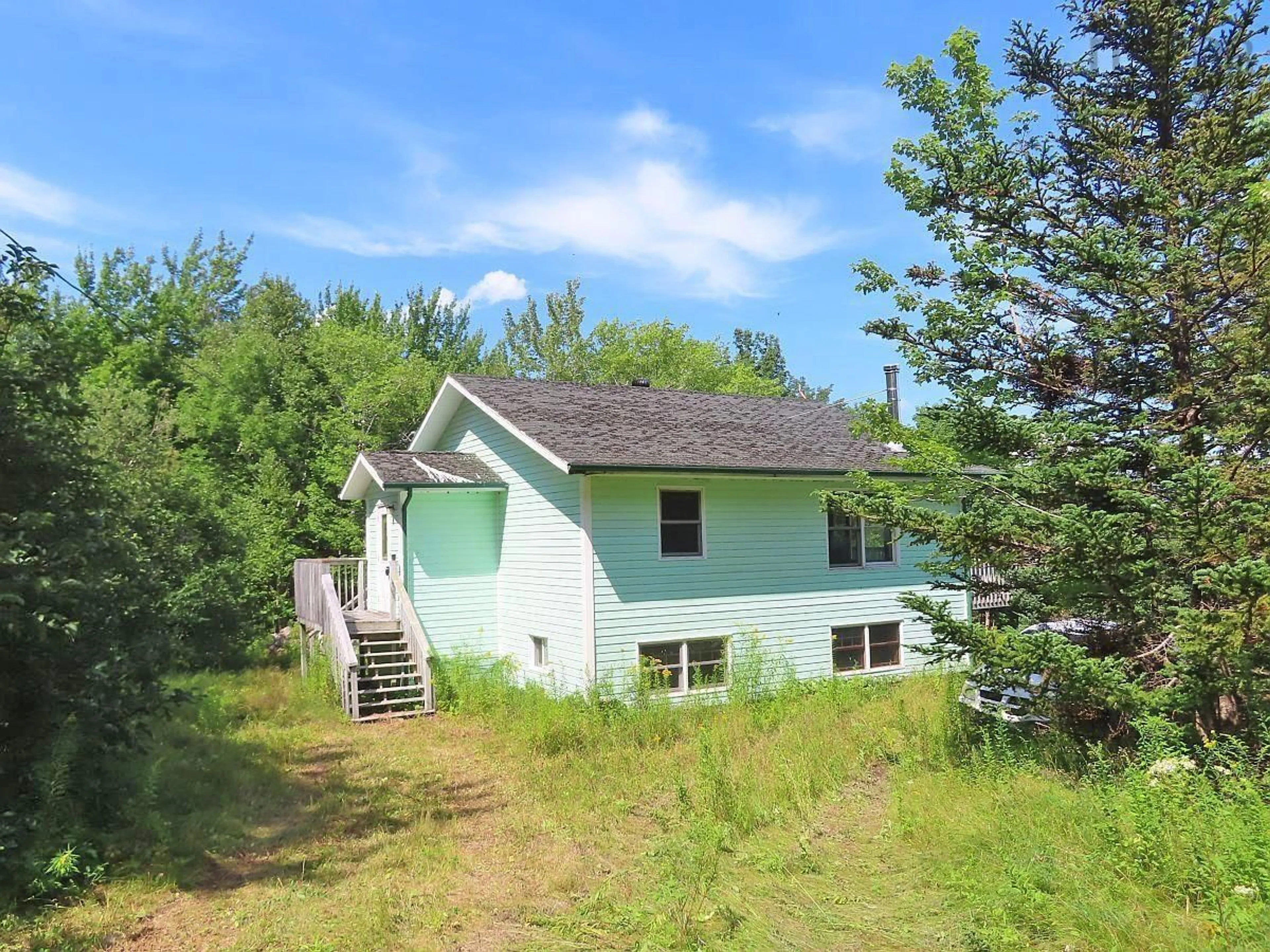 A pic from outside/outdoor area/front of a property/back of a property/a pic from drone, unknown for 5875 West Bay Rd, Roberta Nova Scotia B0E 3K0
