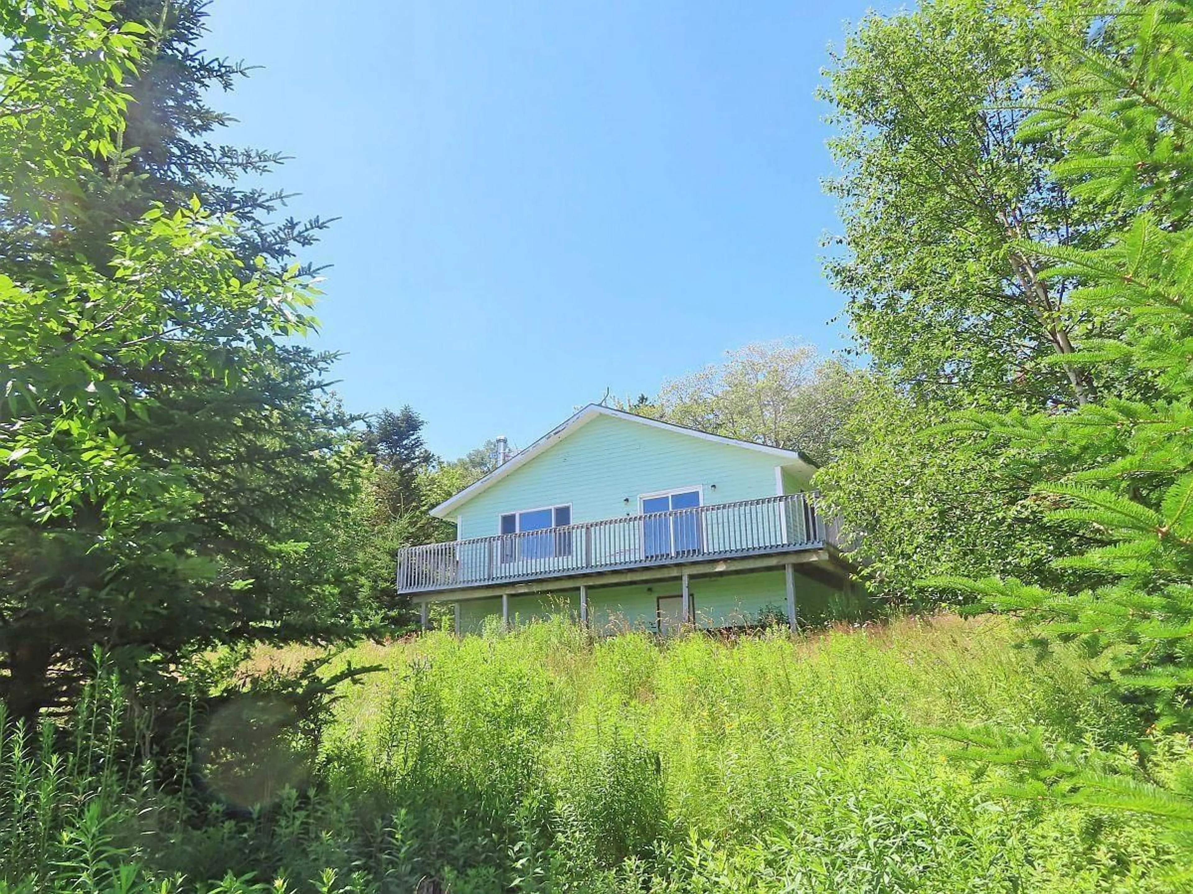A pic from outside/outdoor area/front of a property/back of a property/a pic from drone, water/lake/river/ocean view for 5875 West Bay Rd, Roberta Nova Scotia B0E 3K0
