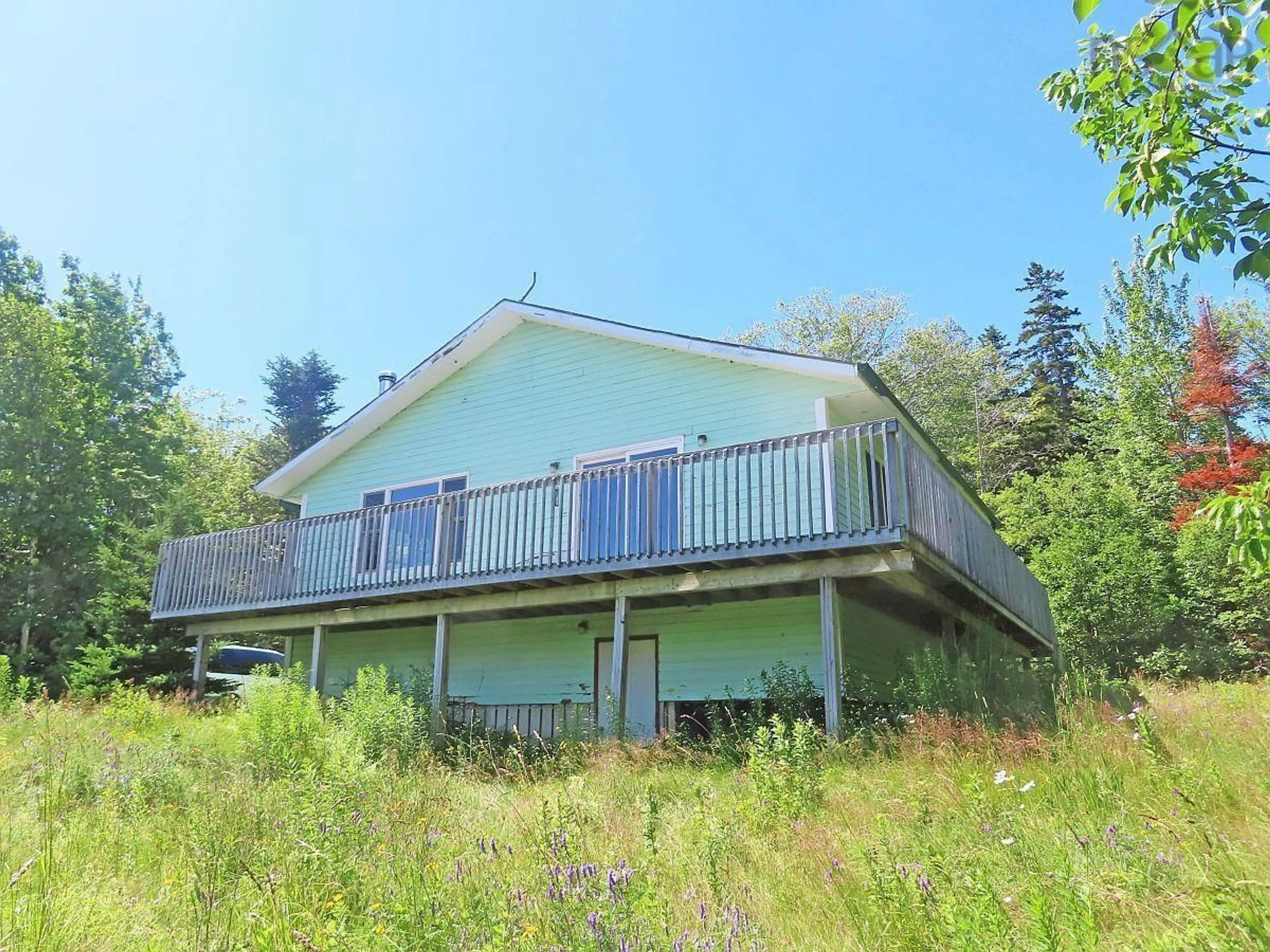 A pic from outside/outdoor area/front of a property/back of a property/a pic from drone, water/lake/river/ocean view for 5875 West Bay Rd, Roberta Nova Scotia B0E 3K0
